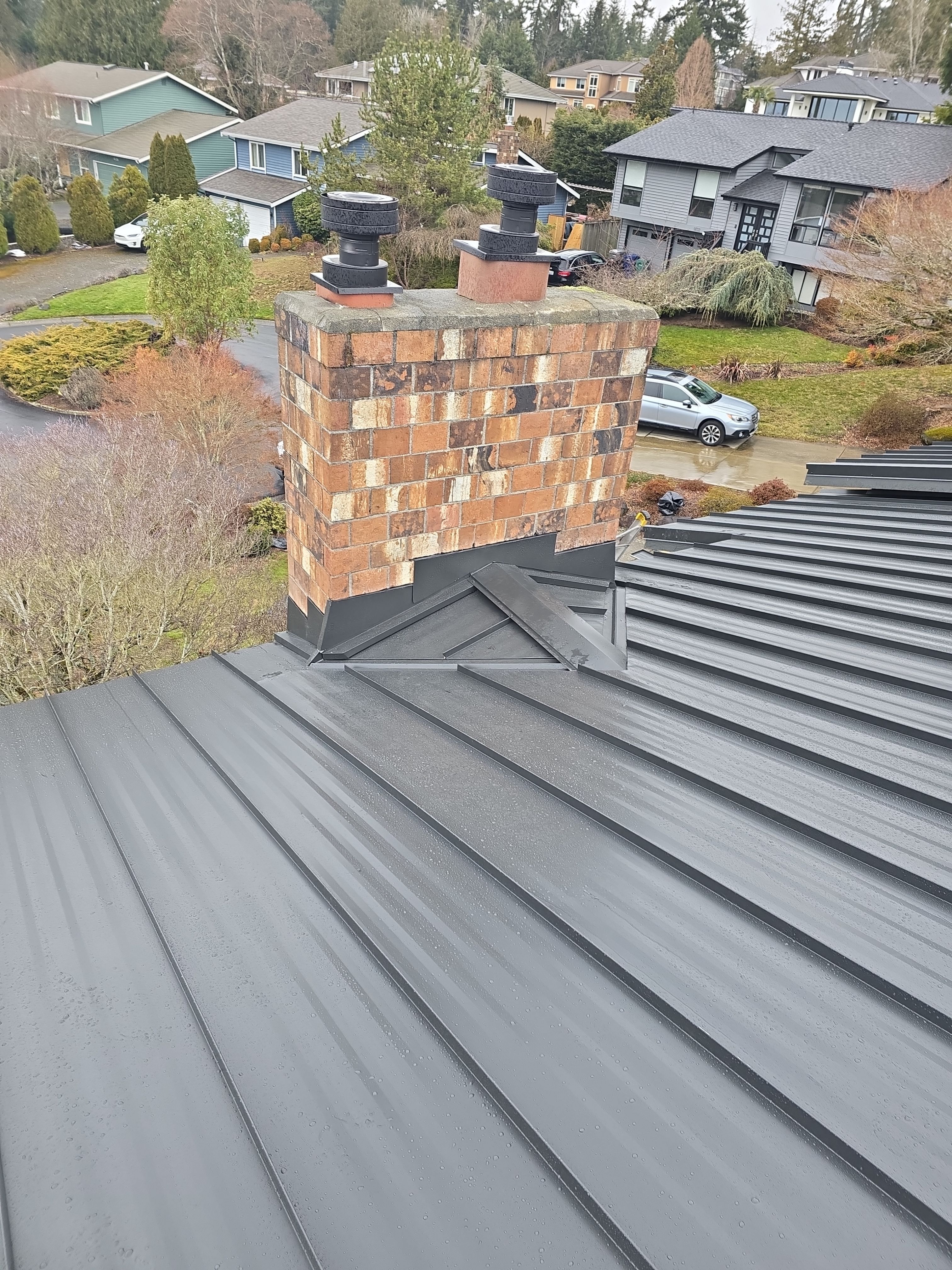Cedar Shake to Standing Seam Metal Roof Project in Kirkland by RoofSmart