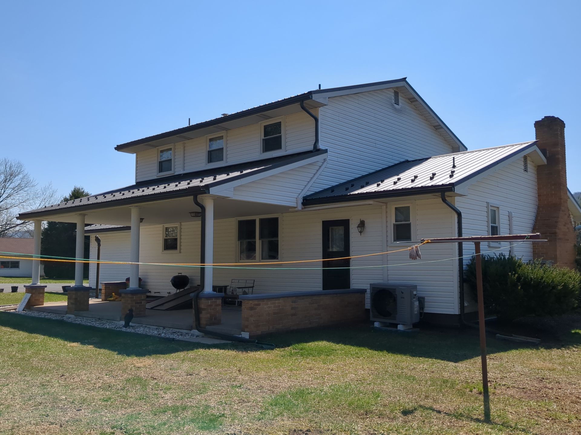 AB Martin Metal Roof Installation-Black by Esh Builders