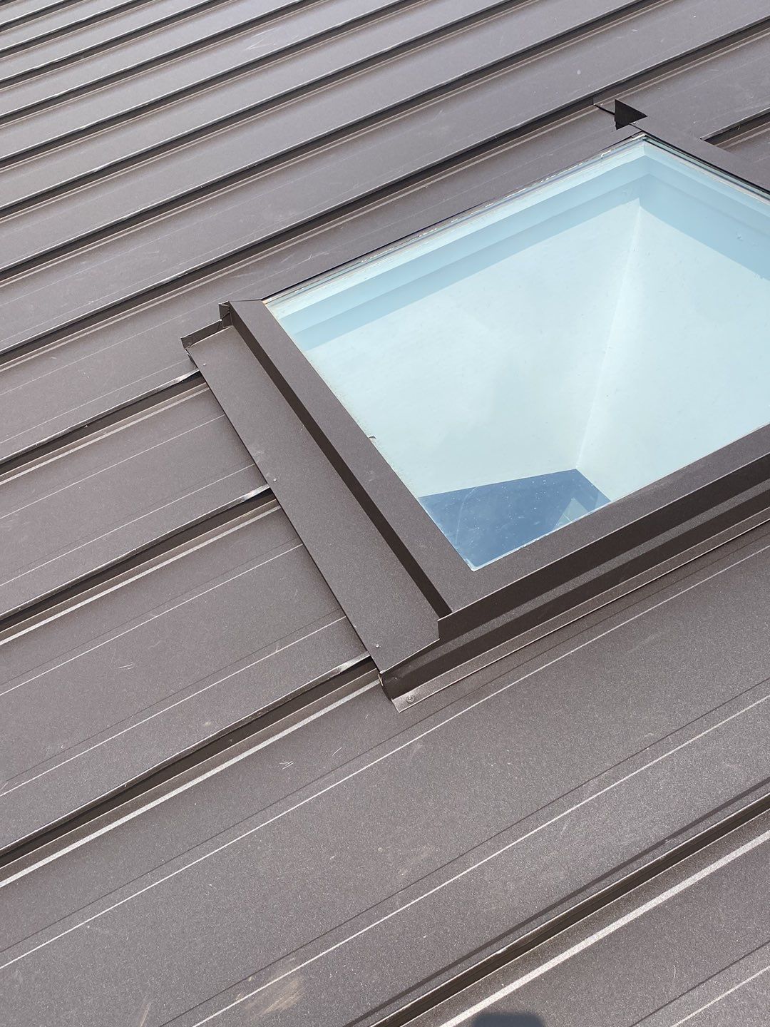 Roof Replacement using 16" Standing Seam Panels by Jay Carter Roofing & Sheet Metal