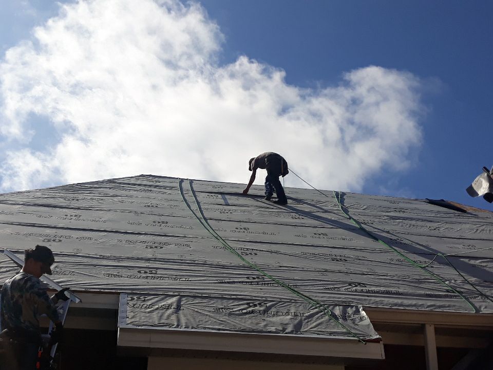 Residential Roofing Installation using Roof Replacement by American Roofing & Construction LLC