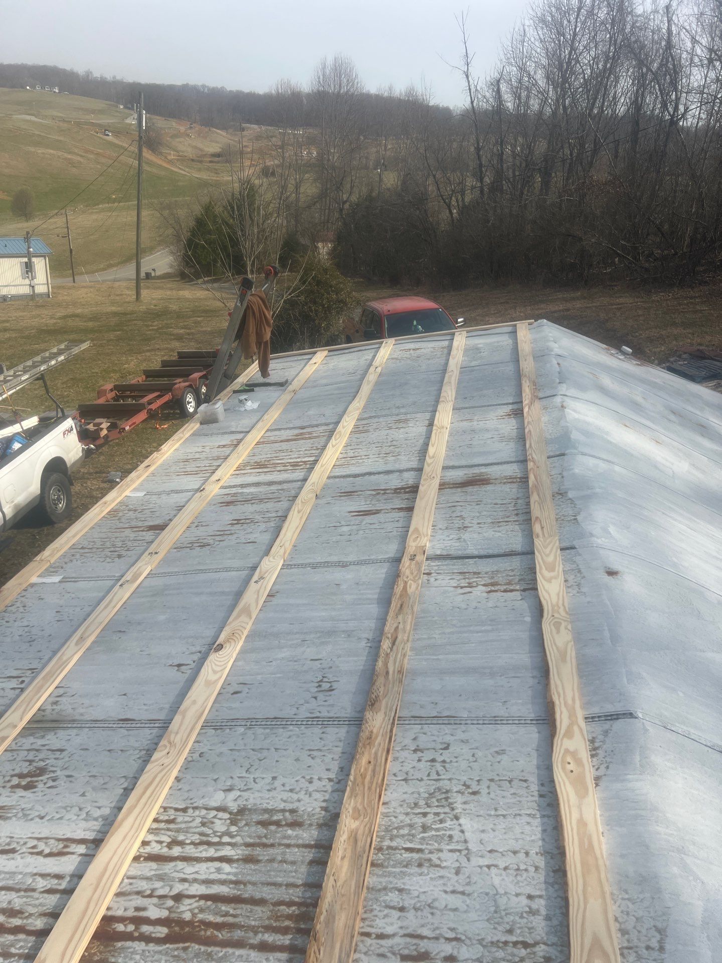 Textured Charcoal Gray using 29 Gauge AG Panel by Omnia Roofing