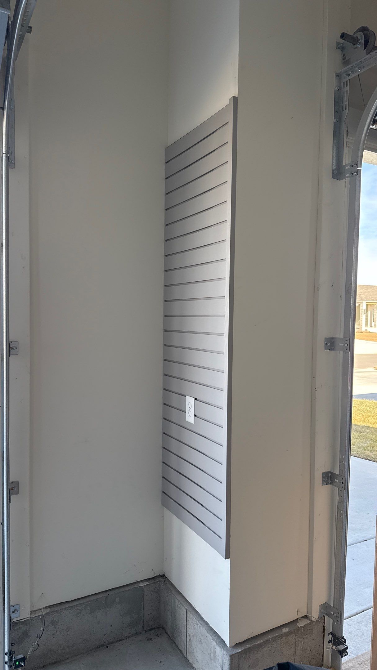 MKE Textured Grey Slatwall Creates A Perfect Storage Start  by Banner Garage