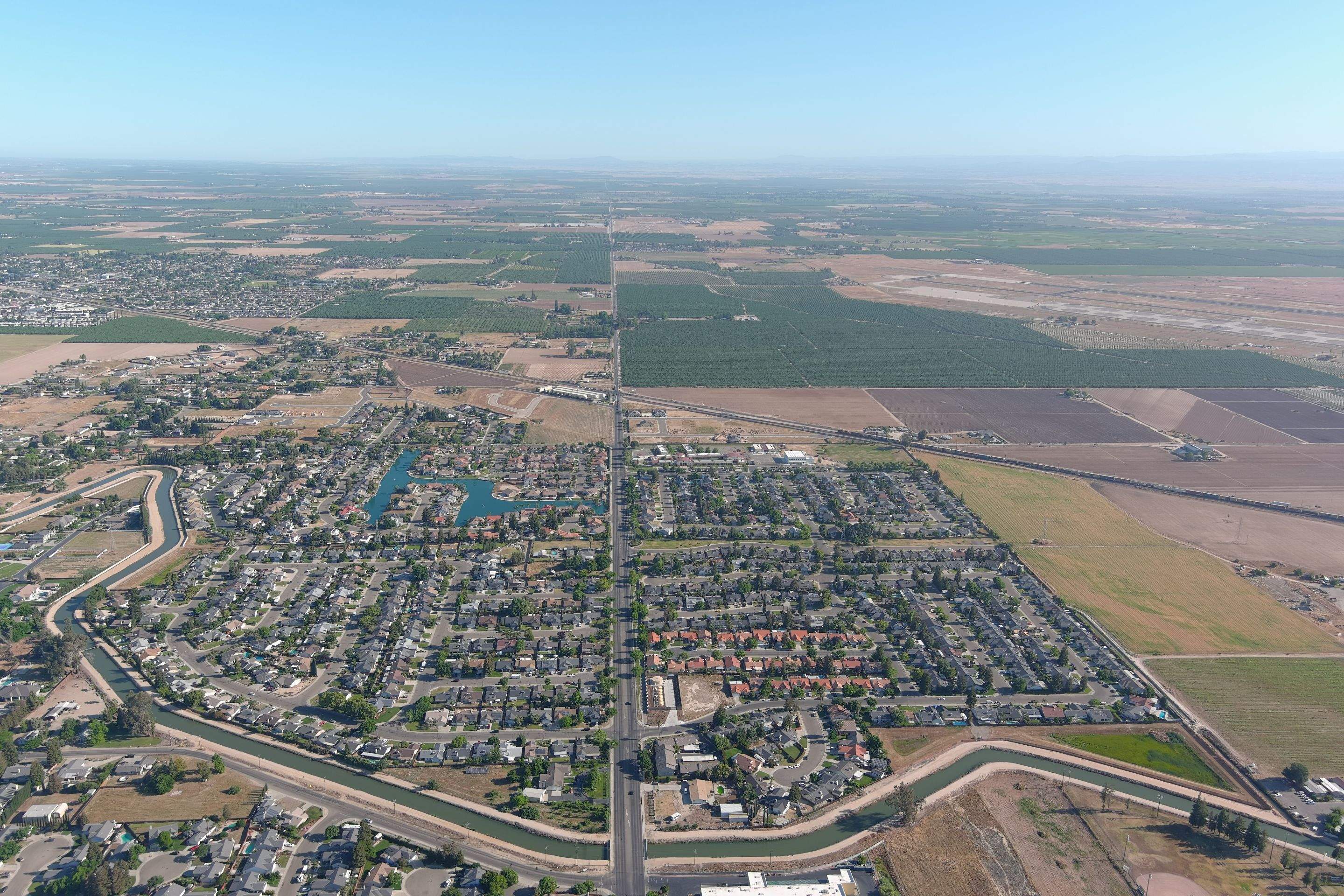 Metal roof restoration on commercial roof using Conklin Benchmark/ PUMA XL acrylic coatings over metal and foam by Straight Edge Roofing Inc