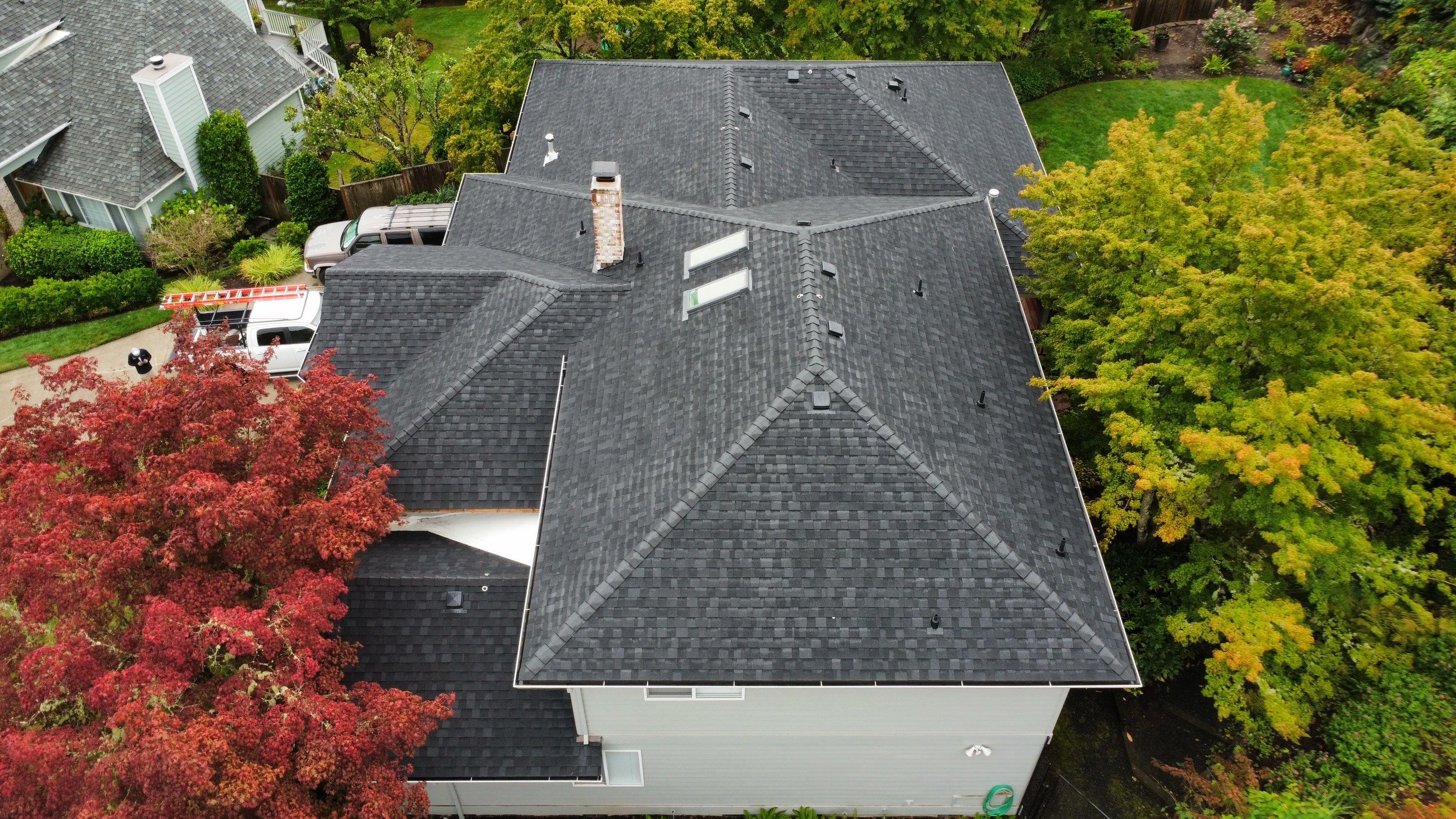 Residential Roofing Installation using IKO Dynasty (Color: Granite Black) by Orezona Building & Roofing Company, Inc.