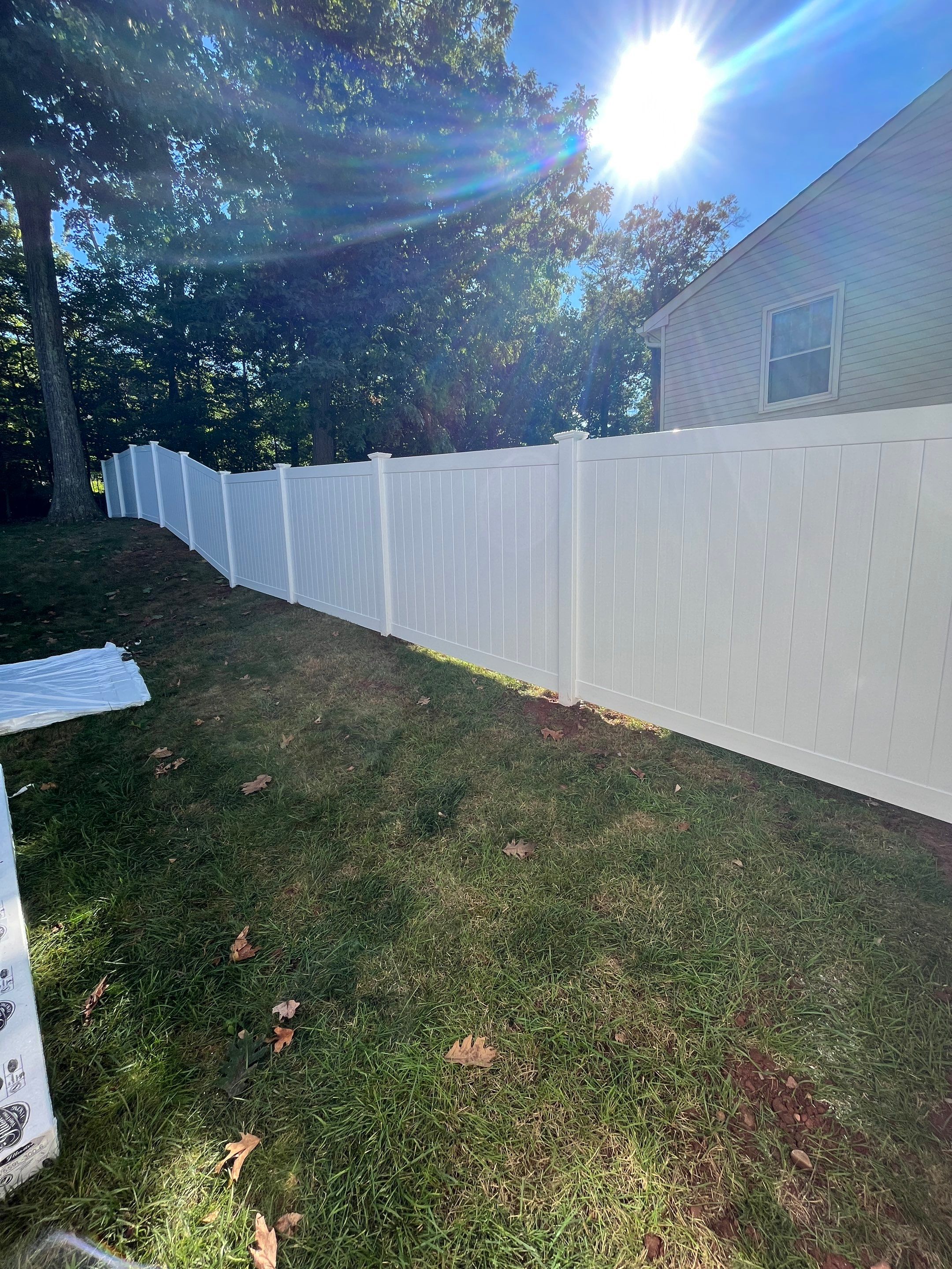 New Vinyl Privacy fence in White with matching gate by DiGiorgi Roofing and Siding Inc