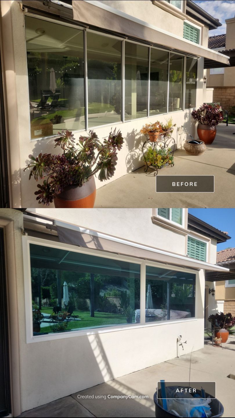 Window Installation using Anlin vinyl windows with Sunshield glass by American Window Company