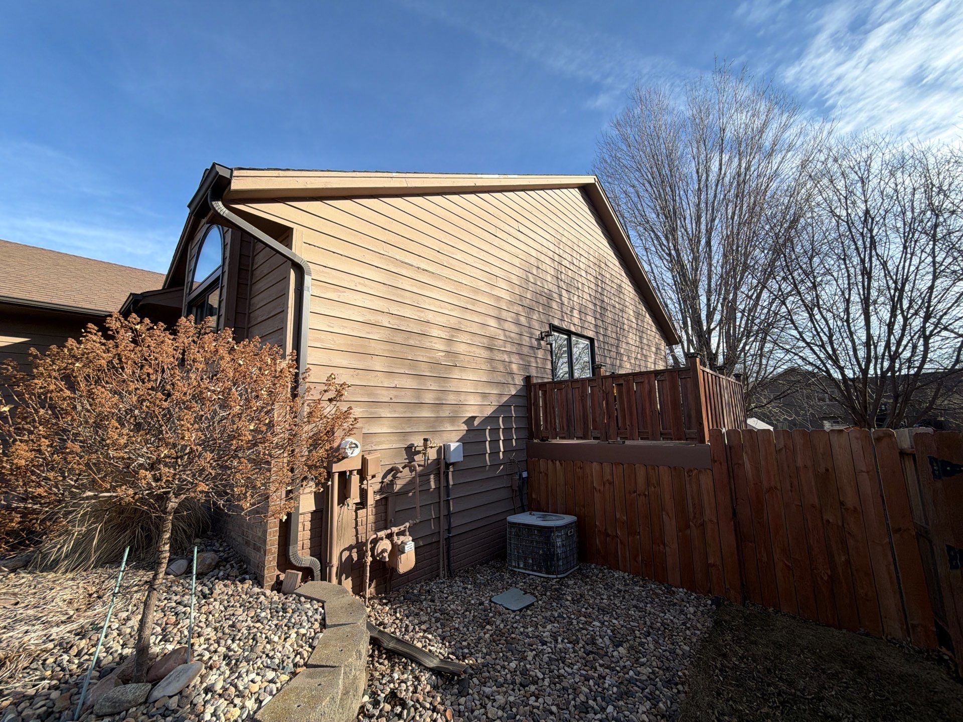 Wood Siding Restoration and Exterior Painting in Sioux Falls by Select Painting, Coatings & Garage Cabinets