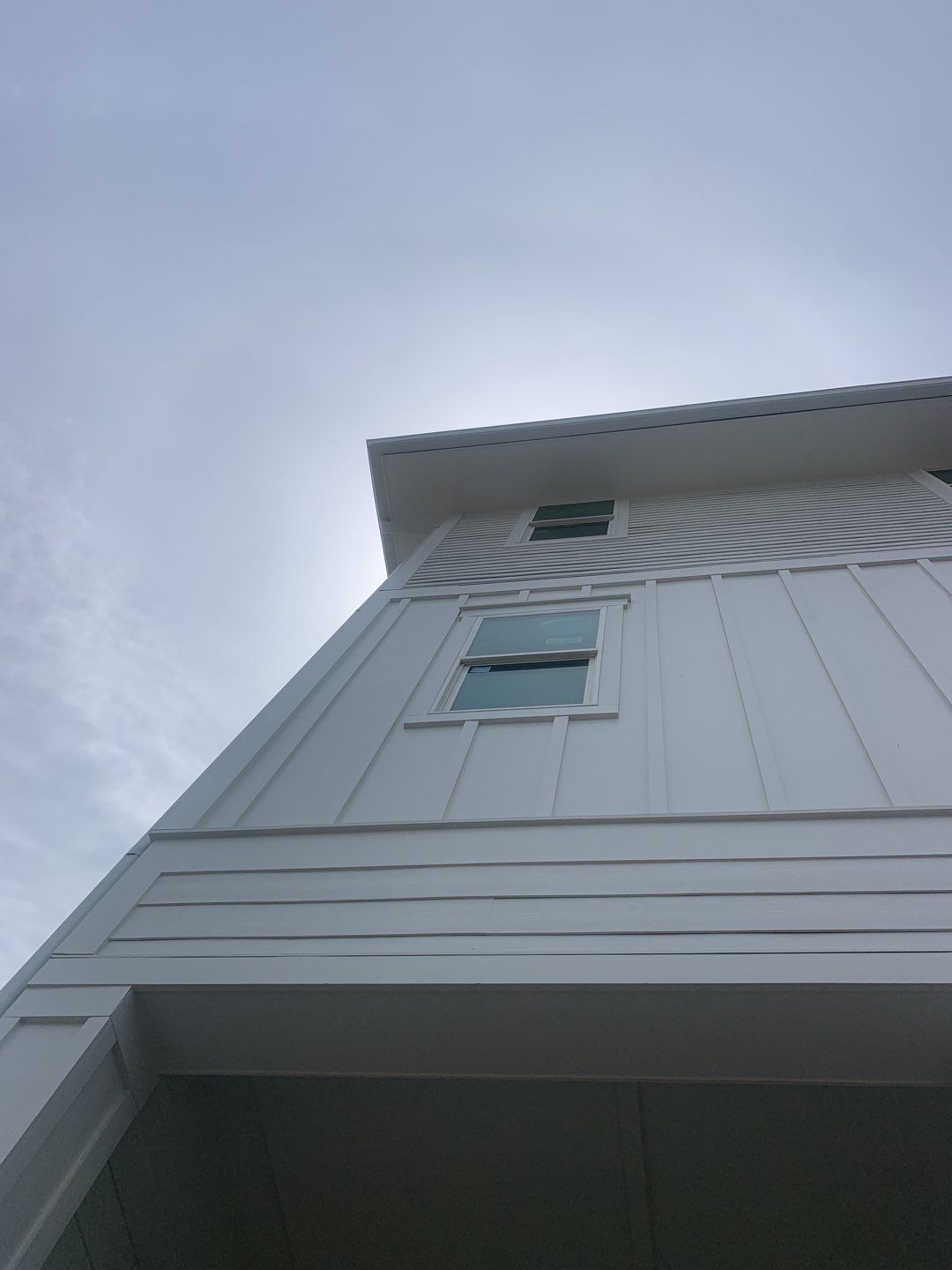 Downspout Installation for Multi-Story Building in Panama City FL by Gutter Professors