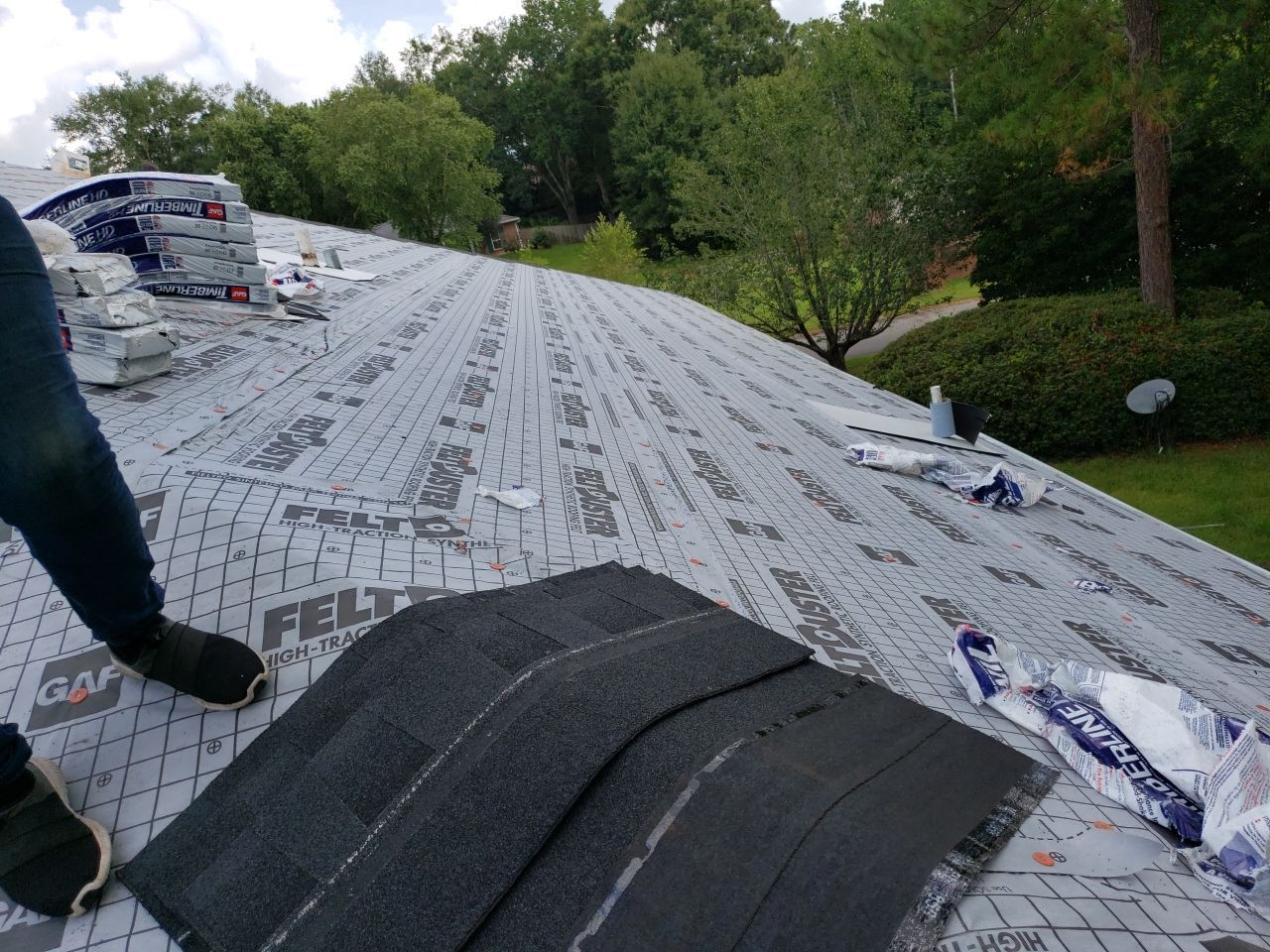 Residential Roofing Installation using Roof Replacement by American Roofing & Construction LLC