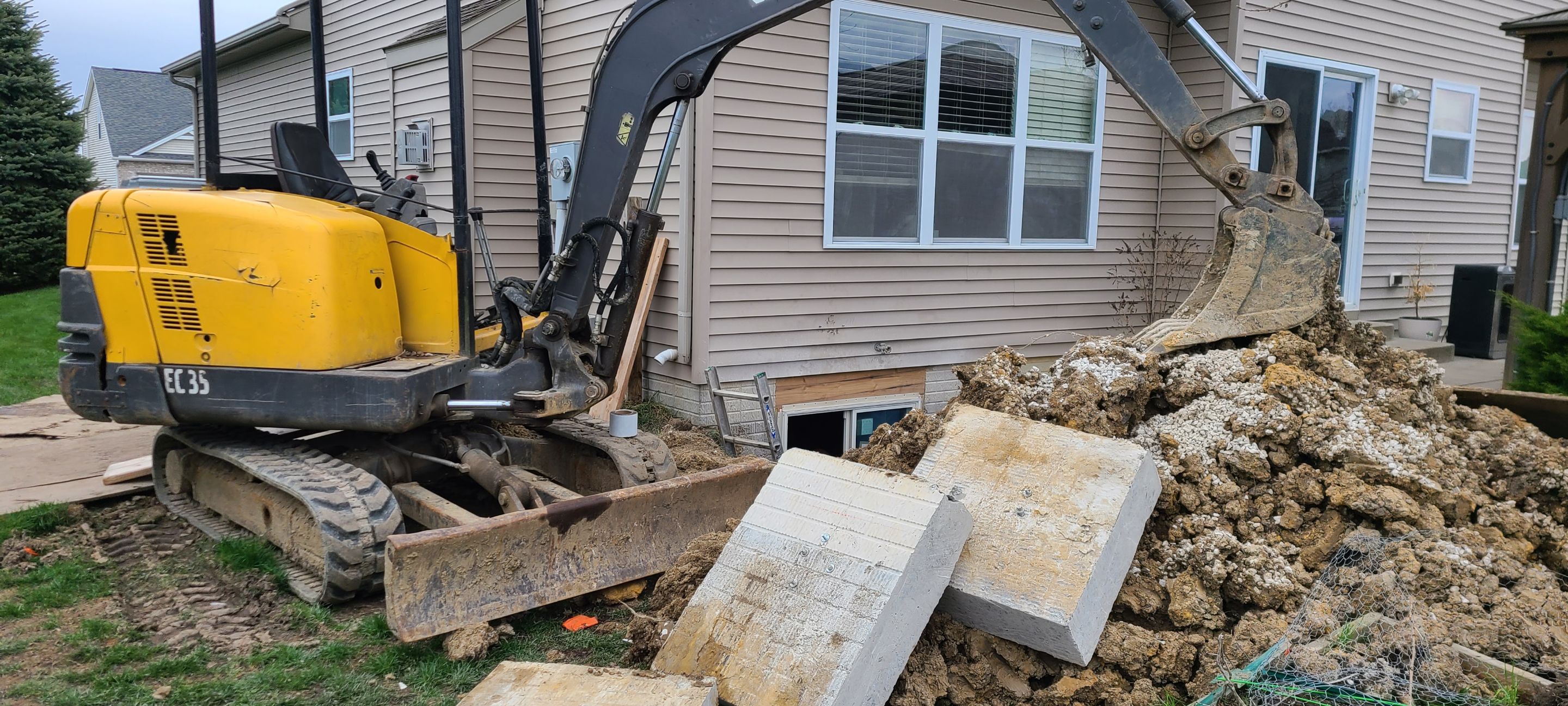 While Steel Egress Window Installation by Toledo Basement Repair