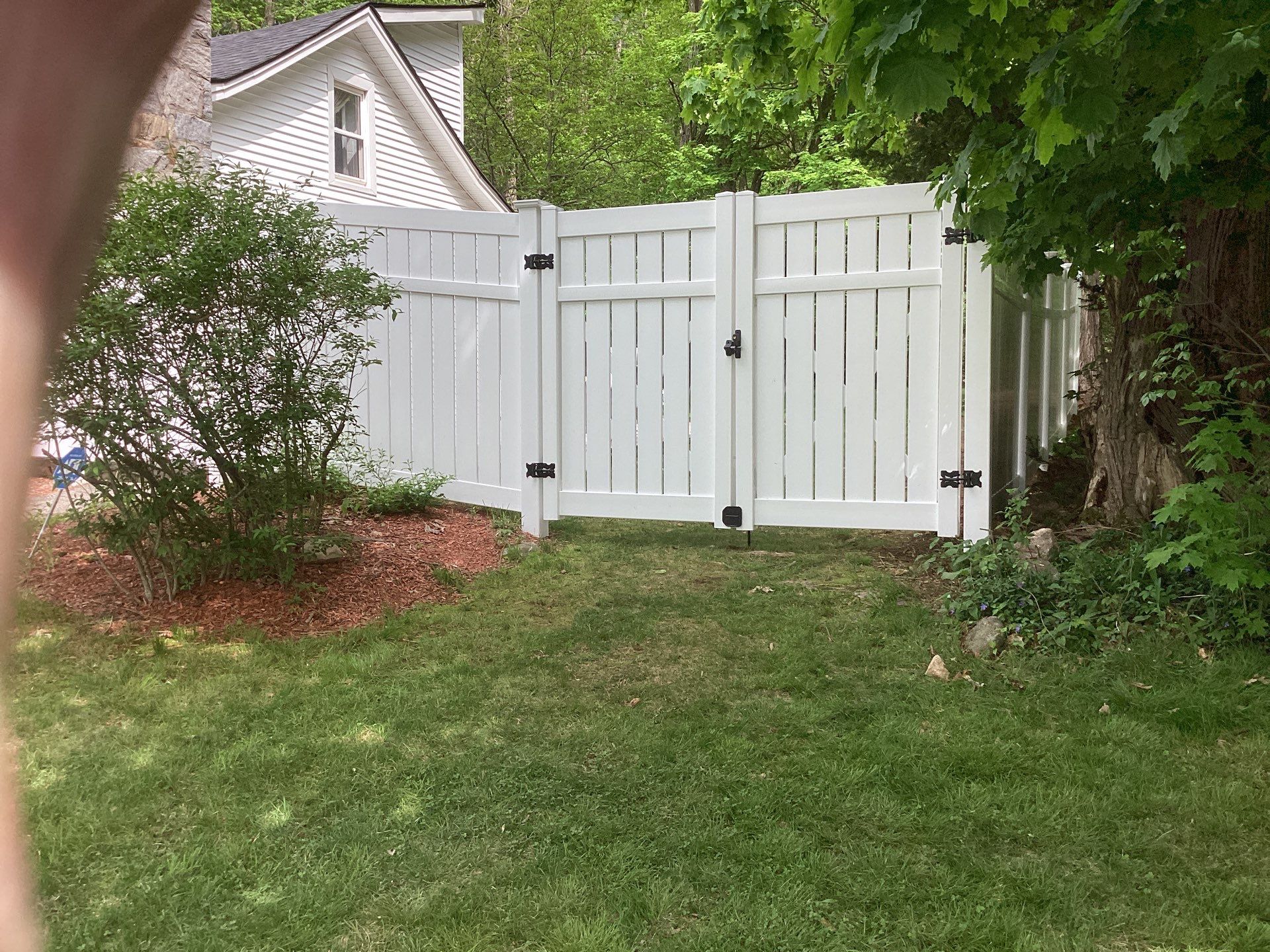 New White Semi privacy Vinyl Fence and matching gates by DiGiorgi Roofing and Siding Inc