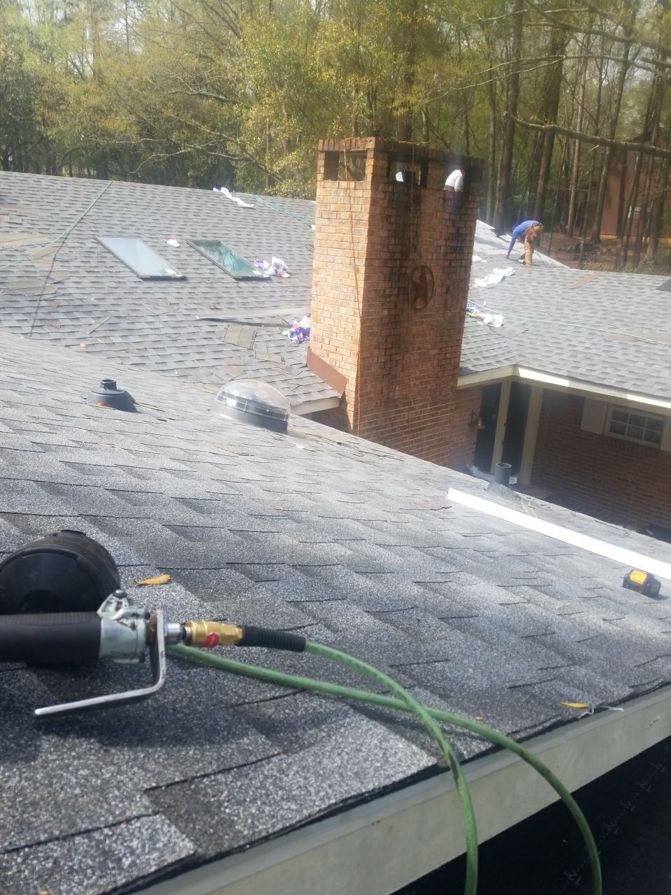 Residential Roofing Installation using Roof Replacement by American Roofing & Construction LLC