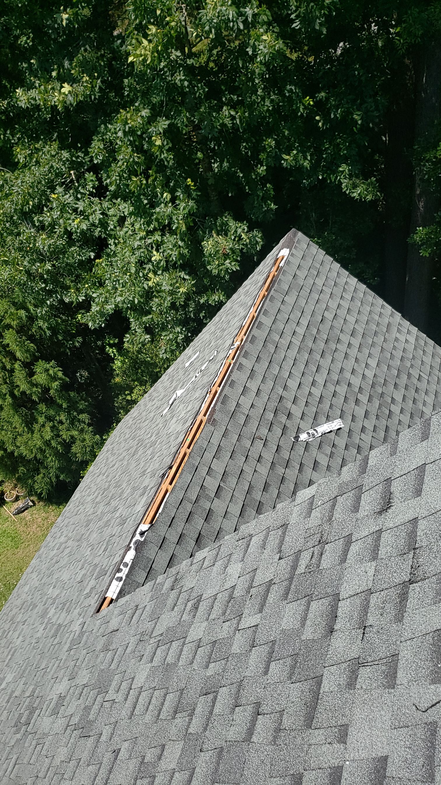 Residential Roofing Installation using Roof Replacement by American Roofing & Construction LLC