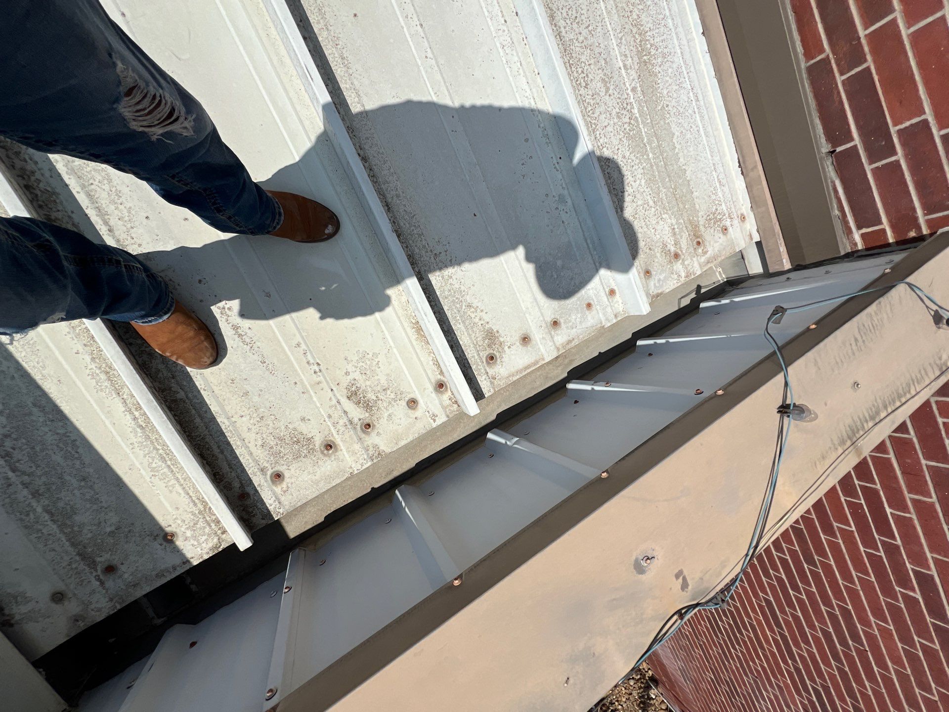 Commercial Roofing Repair using Metal by Roof Repair Company