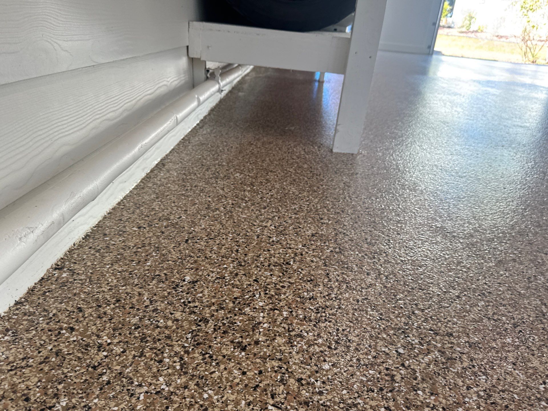 Garage in Hawthorne, FL in Sandstone by Cross Creek Concrete Coatings