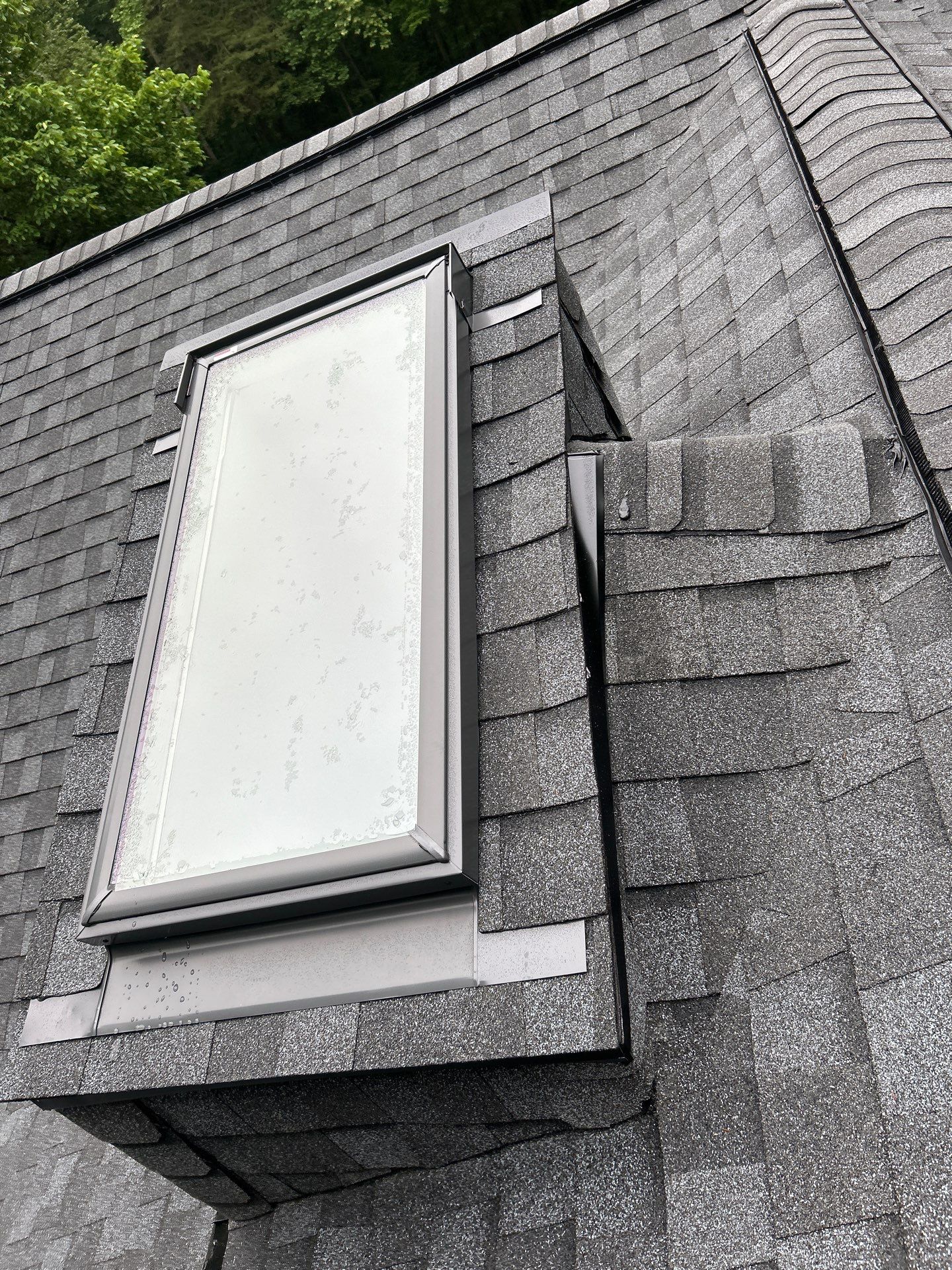 Oakton: Roof Replacement With CertainTeed Landmark Designer Shingles in Pewter by RM Banning, Inc.