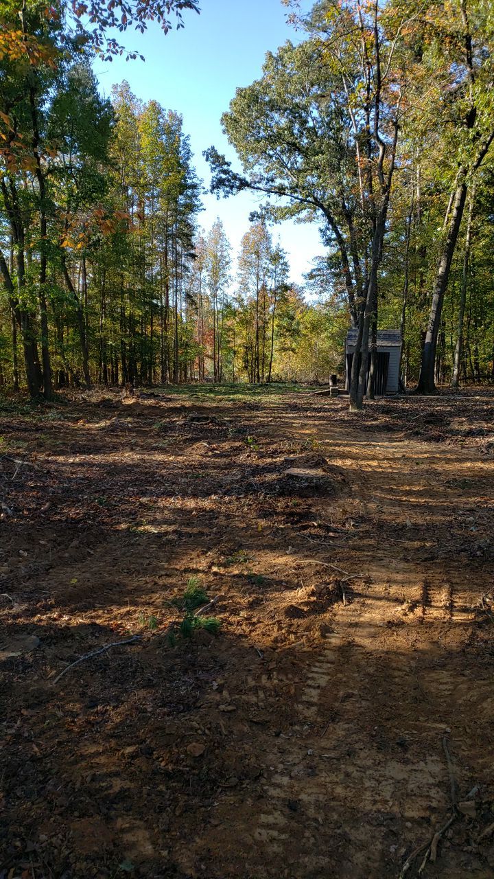 land clearing using machinery by Power Wash Masters LLC