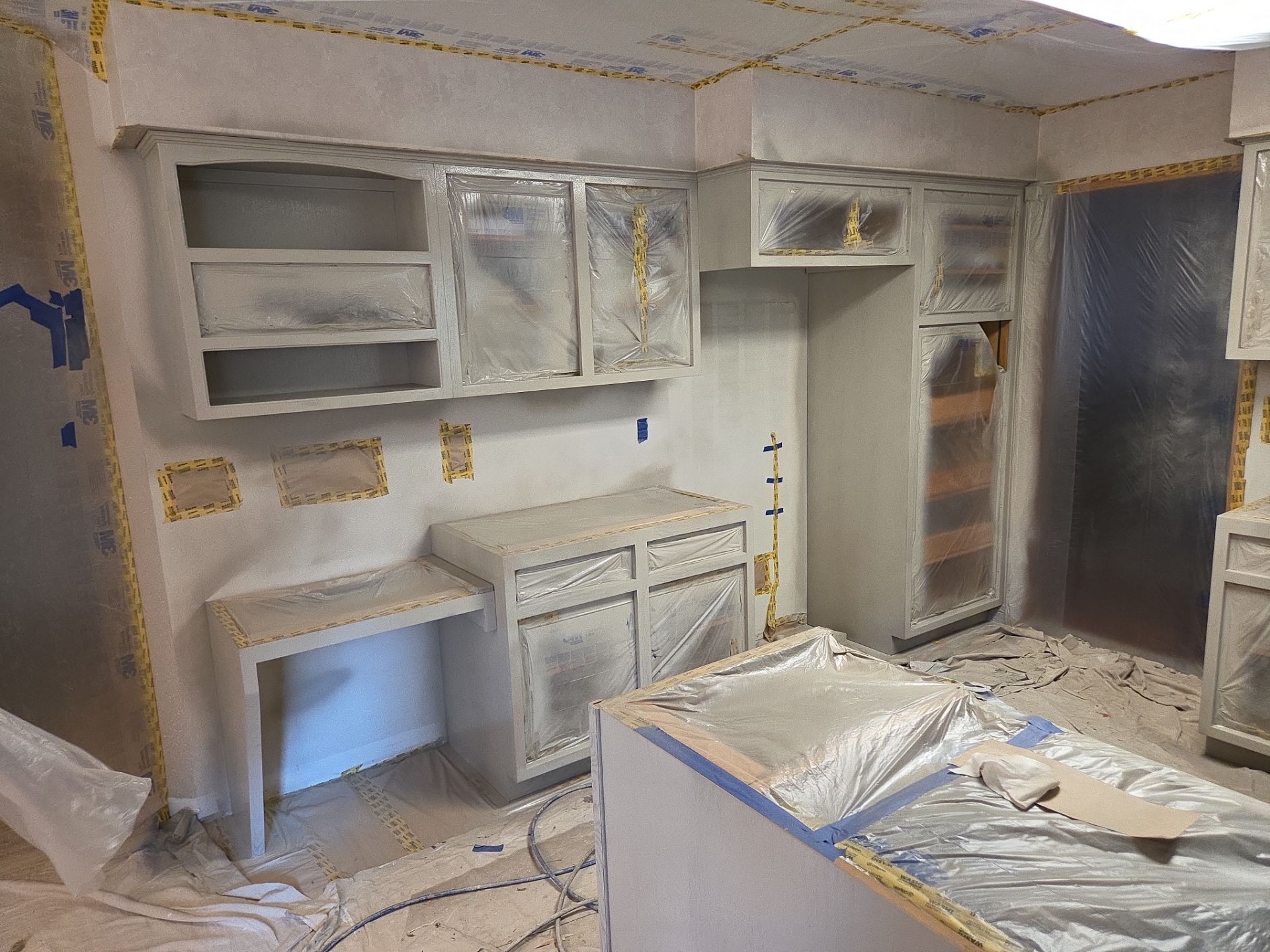 Kitchen Cabinet Painting and Hardware Update in Sioux Falls by Select Painting, Coatings & Garage Cabinets