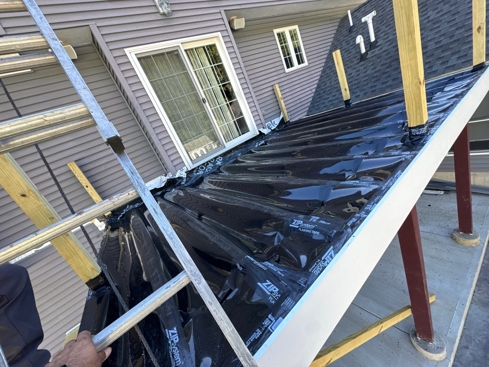 Roof, Trim, Deck, and Gutter Restoration by Mighty Dog Roofing of Greater Middlesex County
