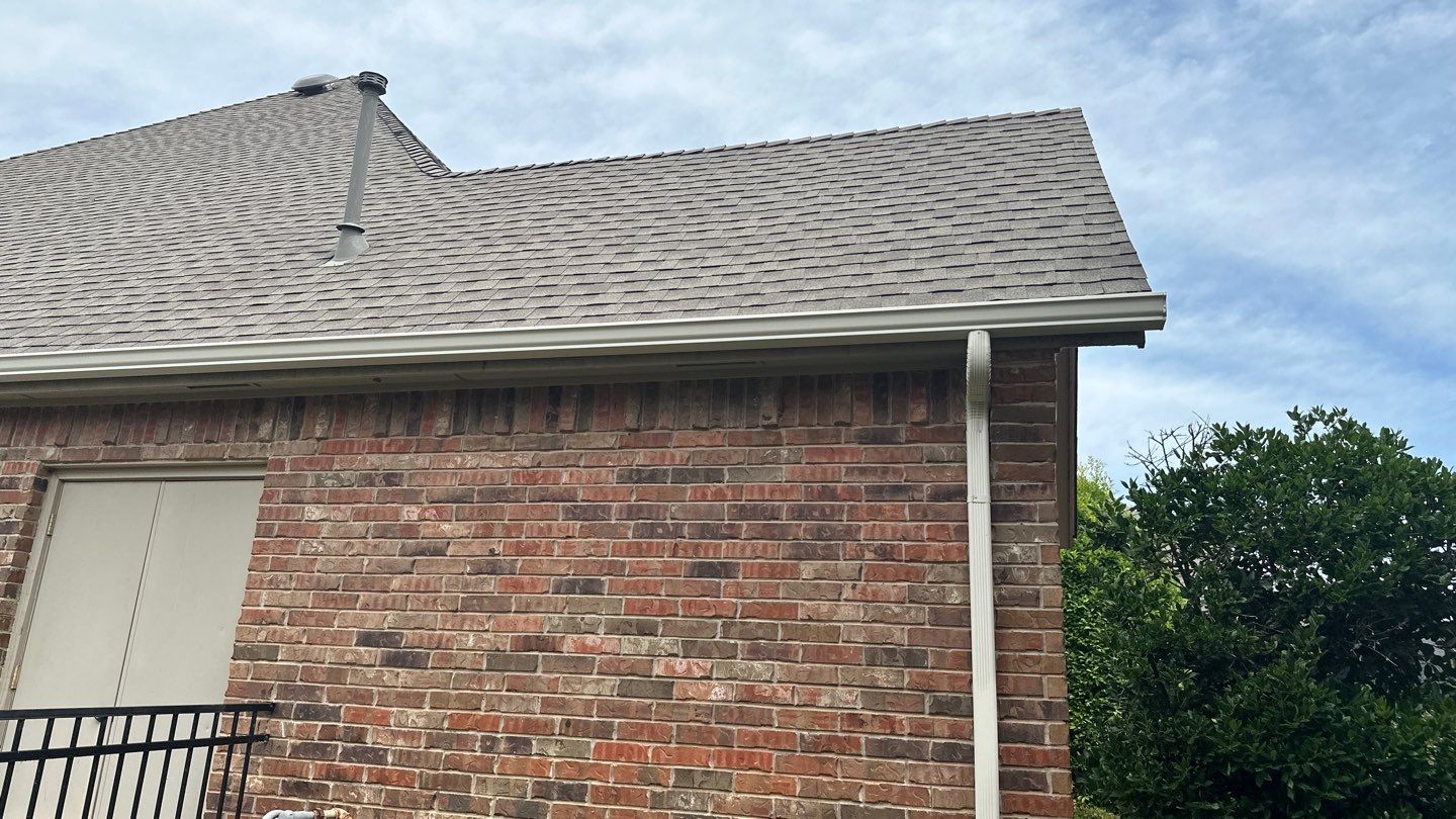 Roof Replacement and Gutter Installation in Edmond, OK by McCann's Roofing and Construction