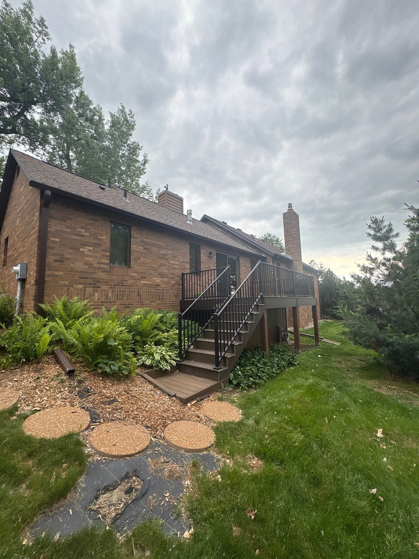 Sioux Falls Exterior Painting and Solid Color Deck Staining by Select Painting, Coatings & Garage Cabinets