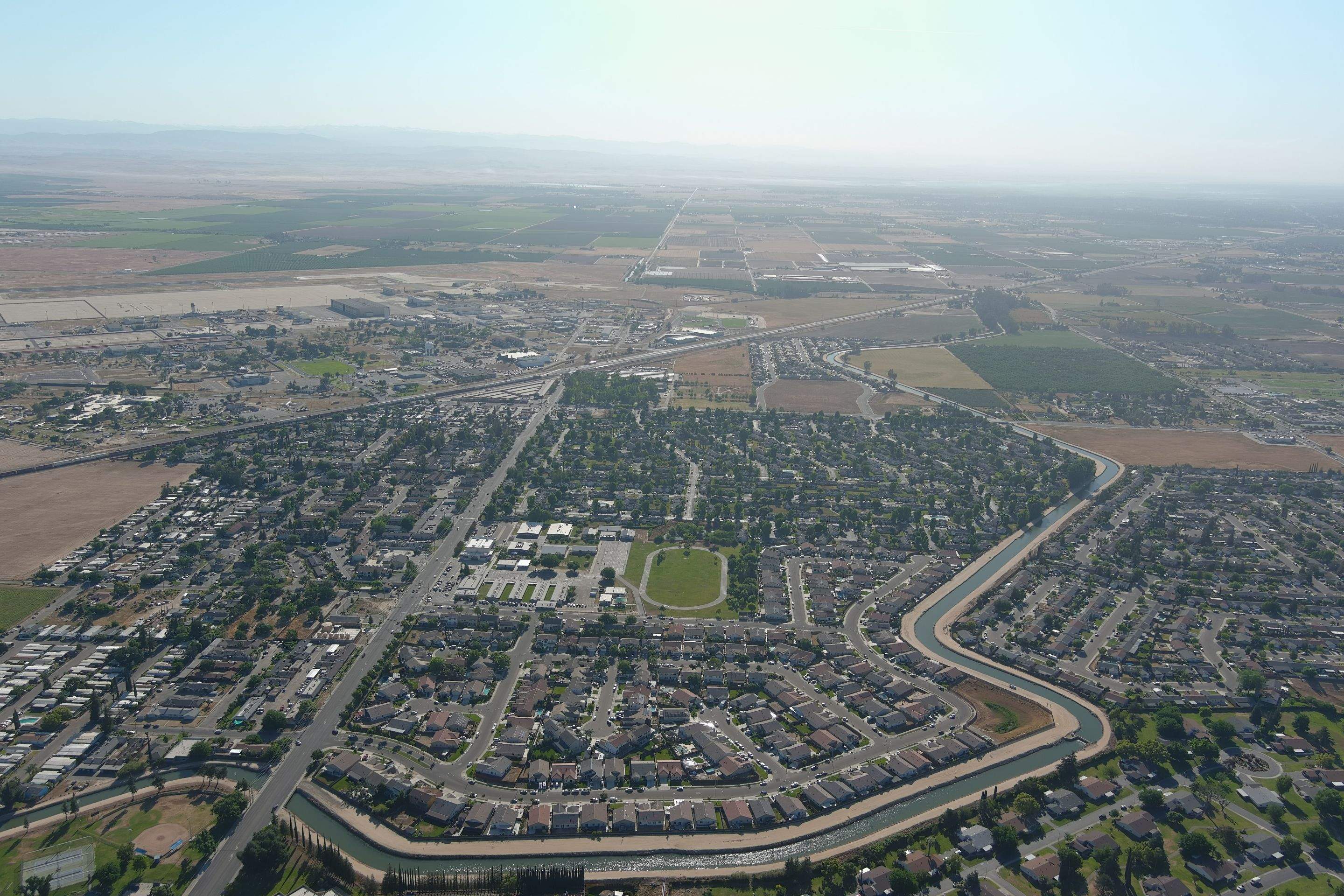 Metal roof restoration on commercial roof using Conklin Benchmark/ PUMA XL acrylic coatings over metal and foam by Straight Edge Roofing Inc