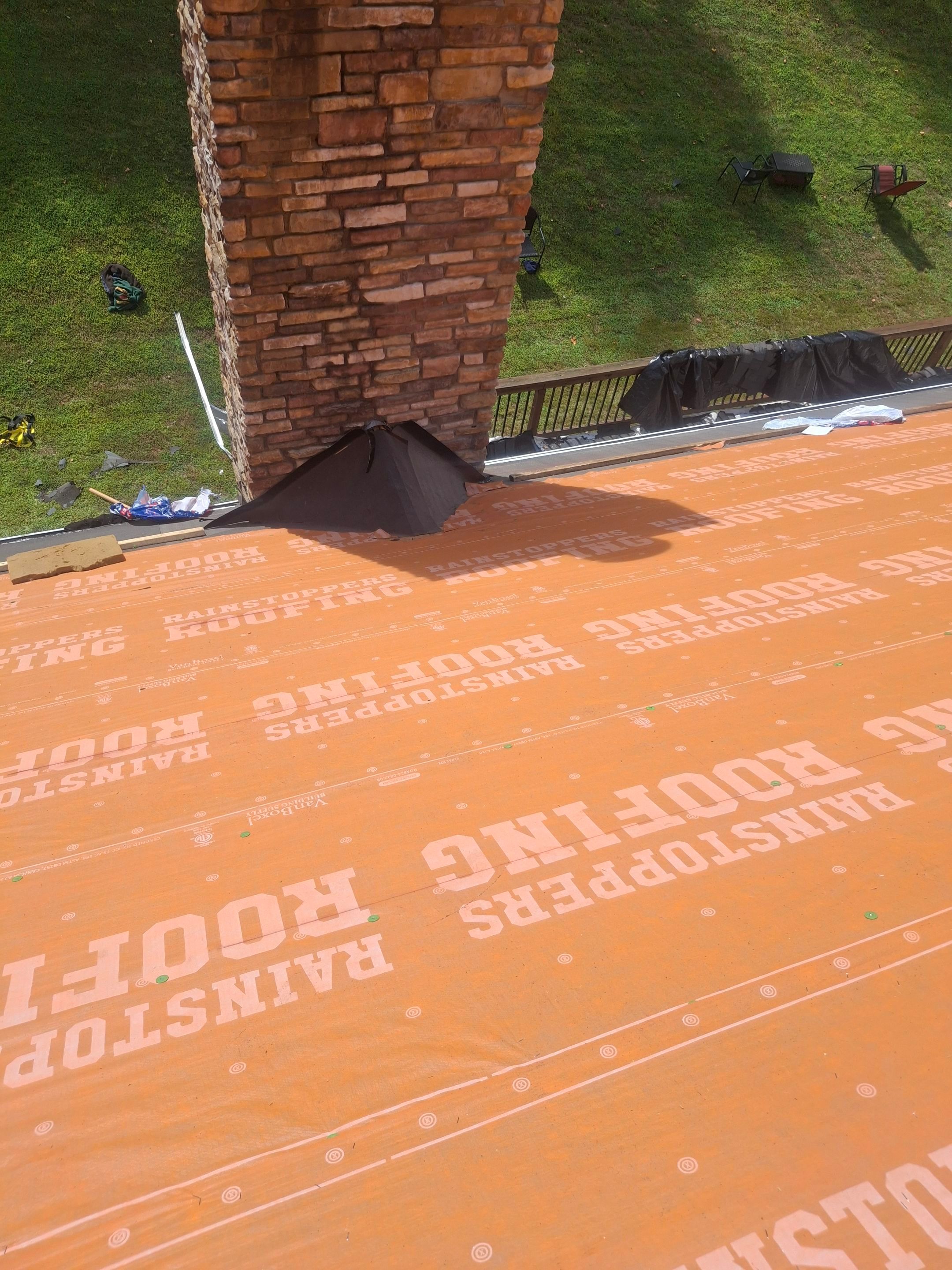 Residential Roofing Installation using GAF Timberline HDZ Charcoal by Rainstoppers Roofing