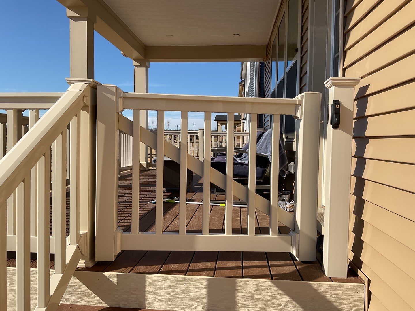Deck Installation using New Vinyl Gate  by Alpha Design Services