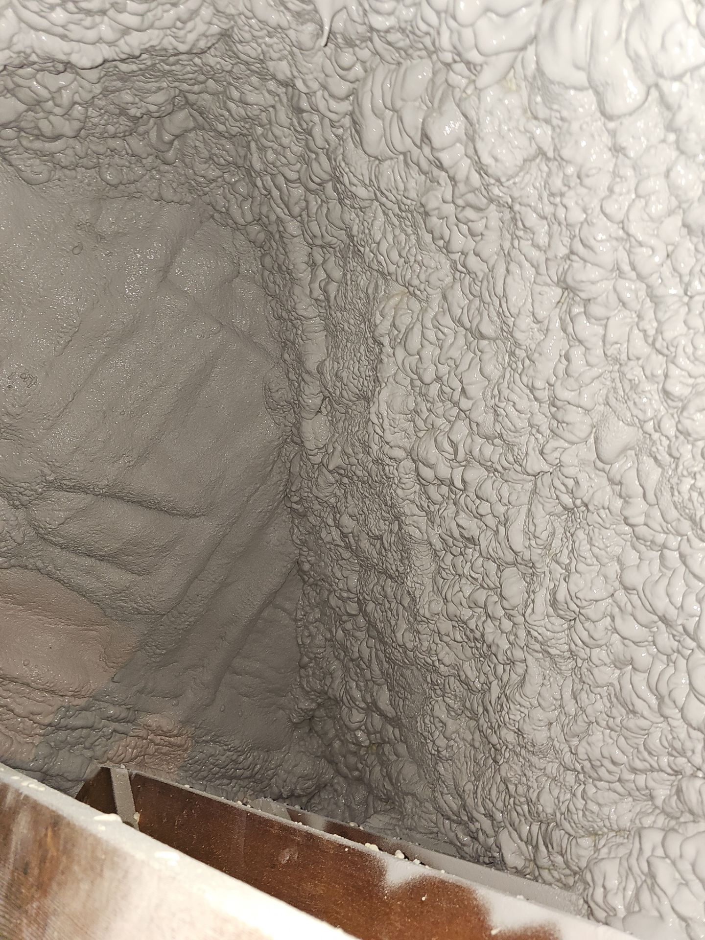 Attic Retrofit using open cell spray foam by NYS Foam & Energy