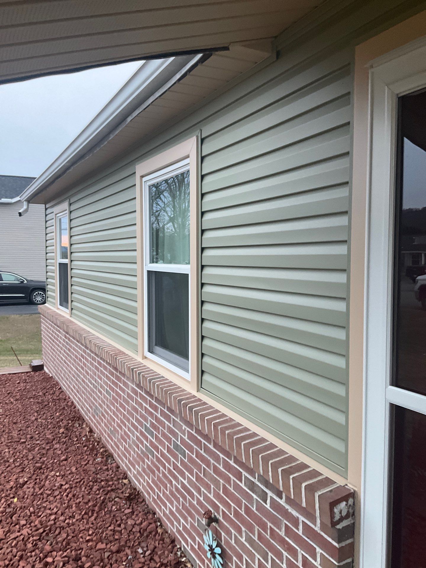 Vinyl Siding Replacement and Patio Door Installation in Elizabethville by Esh Builders