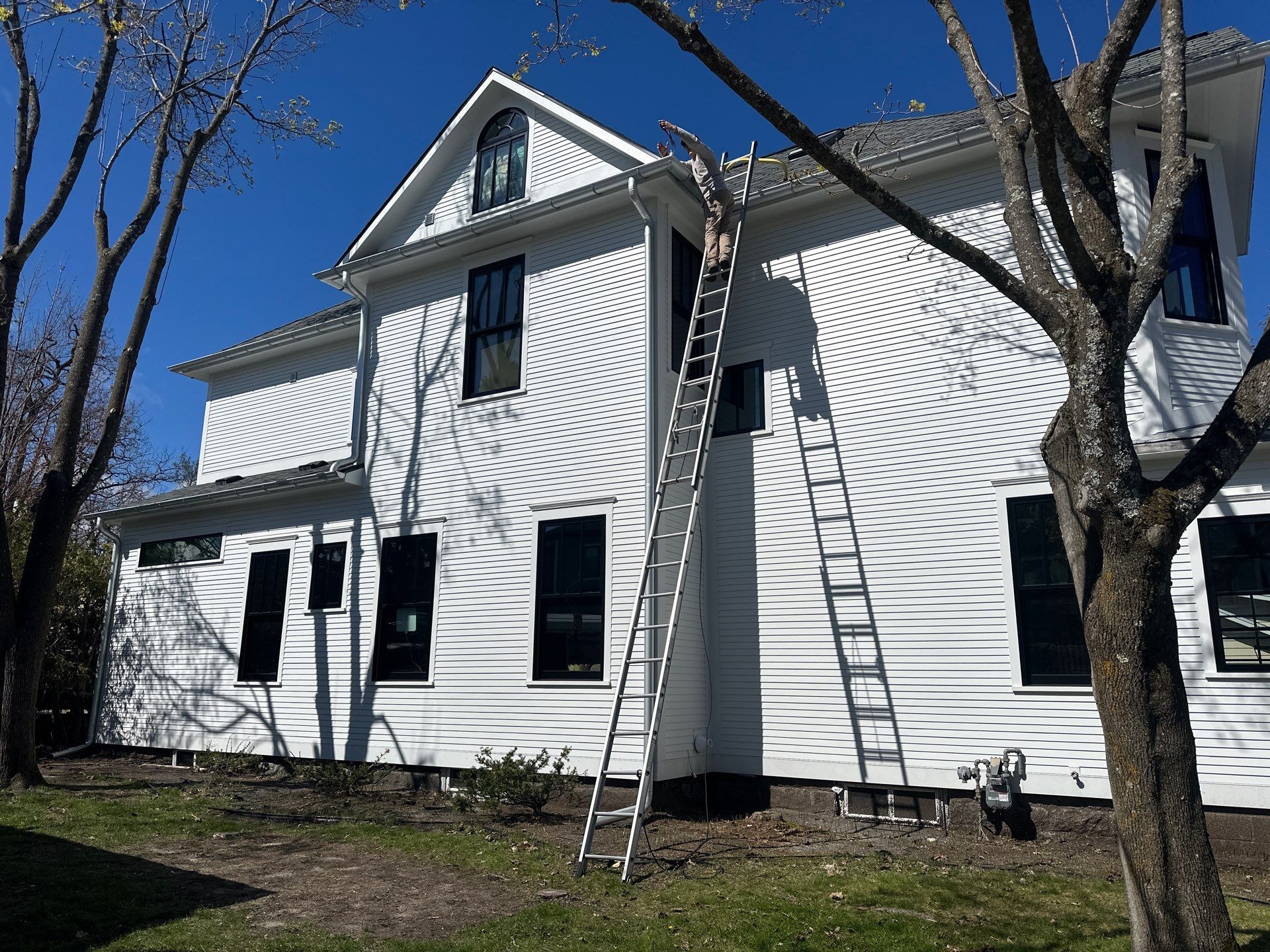 New Galvalume Half Round Gutter Installation for Petoskey Residential Home by Rainbow Seamless Systems