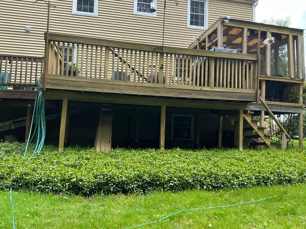 Deck and Screened in room replacement with Trex Saddle and vintage lantern railings by DiGiorgi Roofing and Siding Inc