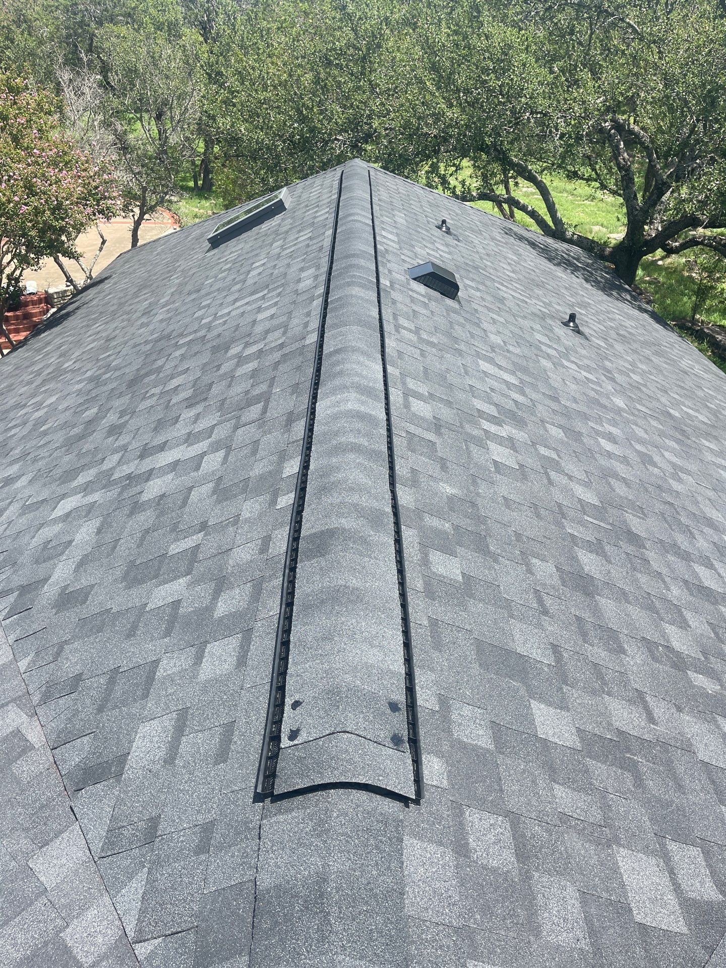 Residential Roofing Installation using IKO Nordic Granite Black by DeZign Roofing & Exteriors