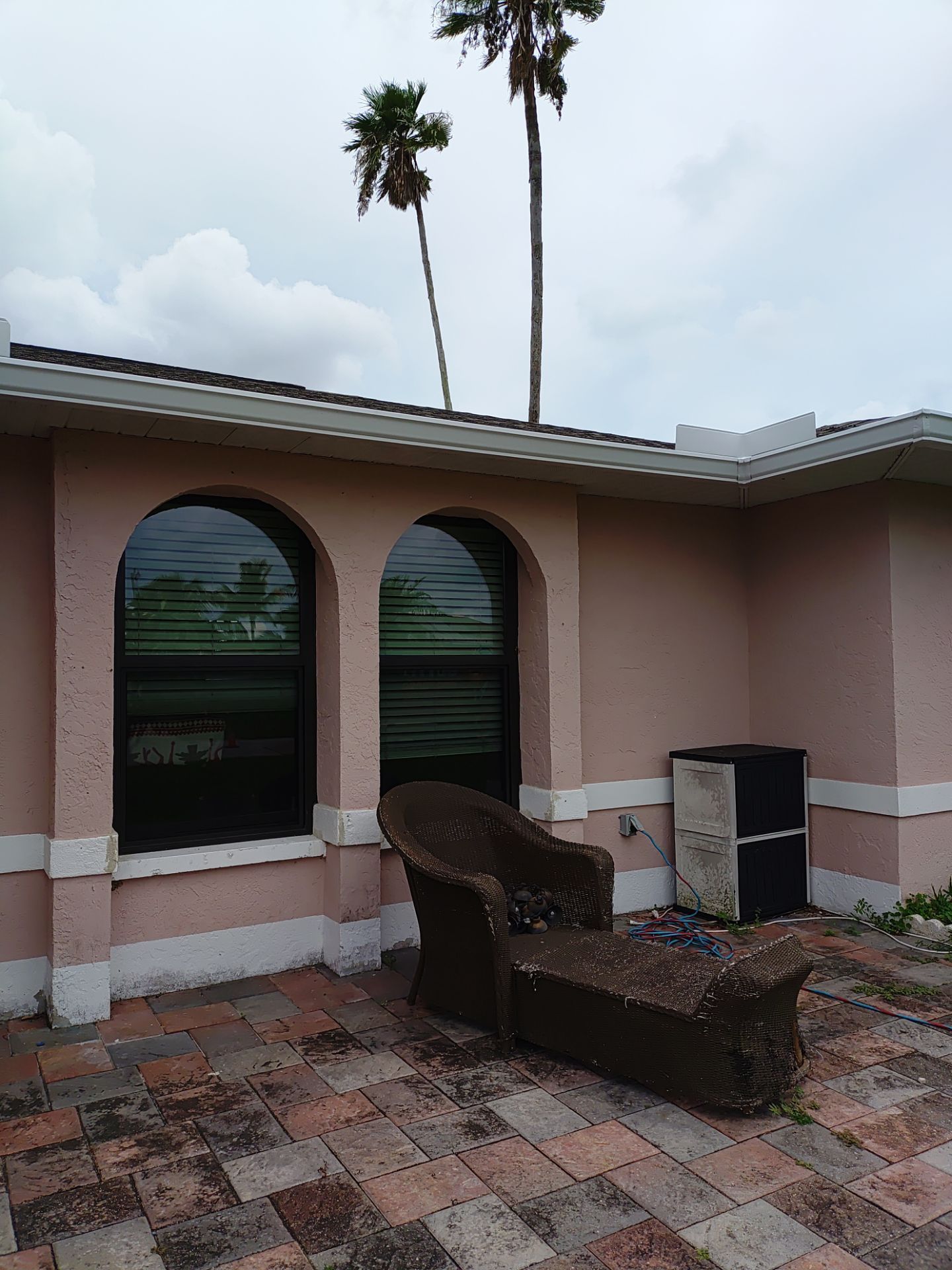 Replace gutter using White Down Spouts in Cape Coral FL by Gutter Professors