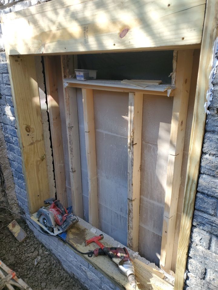 Egress Window Installation using Rockwell Egress Fiberglass Egress Window Well by Toledo Basement Repair 
