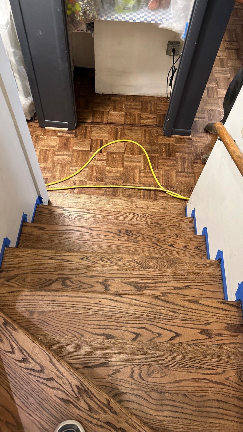 Parquet floor and stair treads by Footprints Floors of Nashville