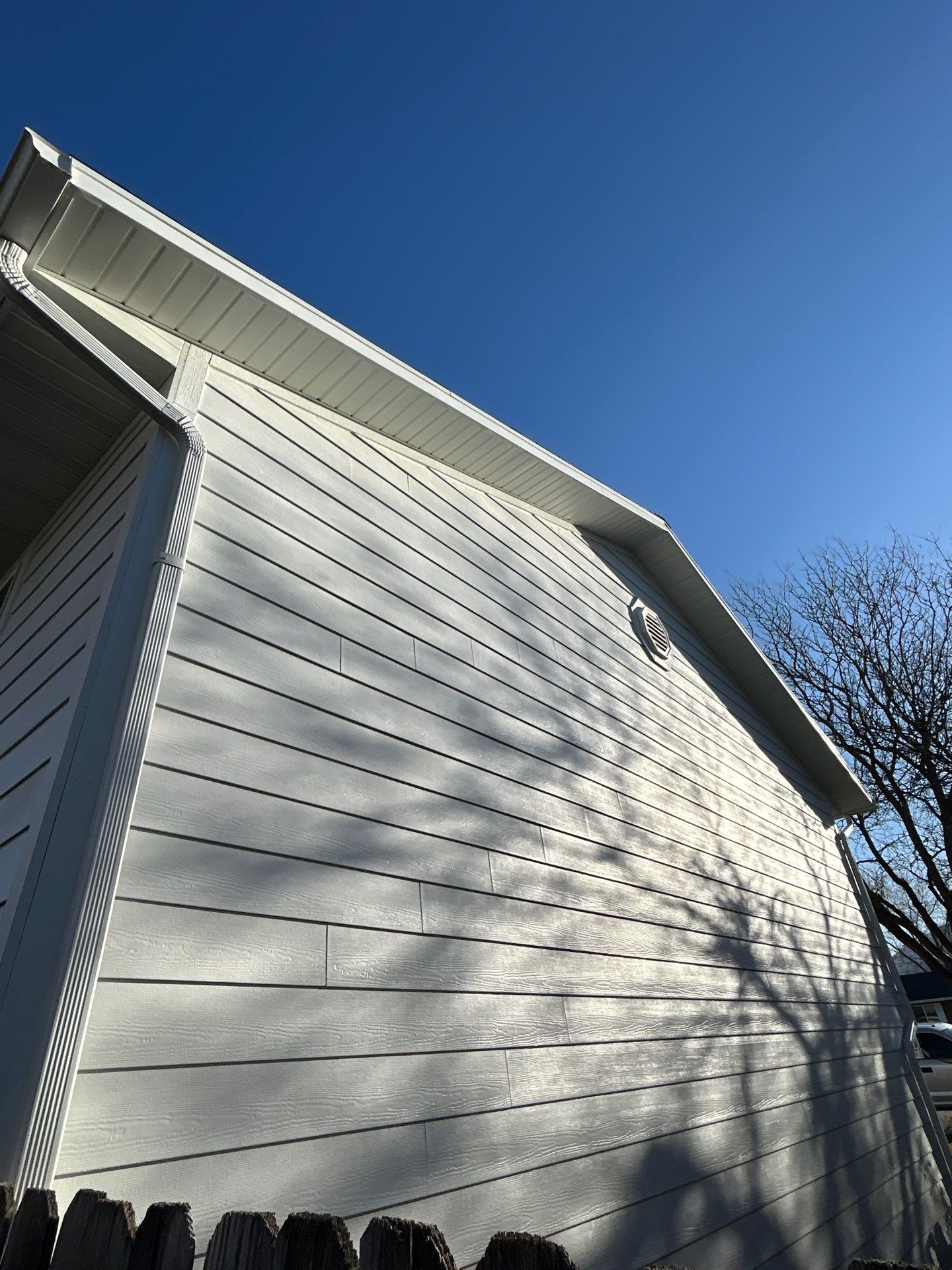 Orem | Crisp Monochromatic Hardie Upgrade | Arctic White by Ideal Siding Utah