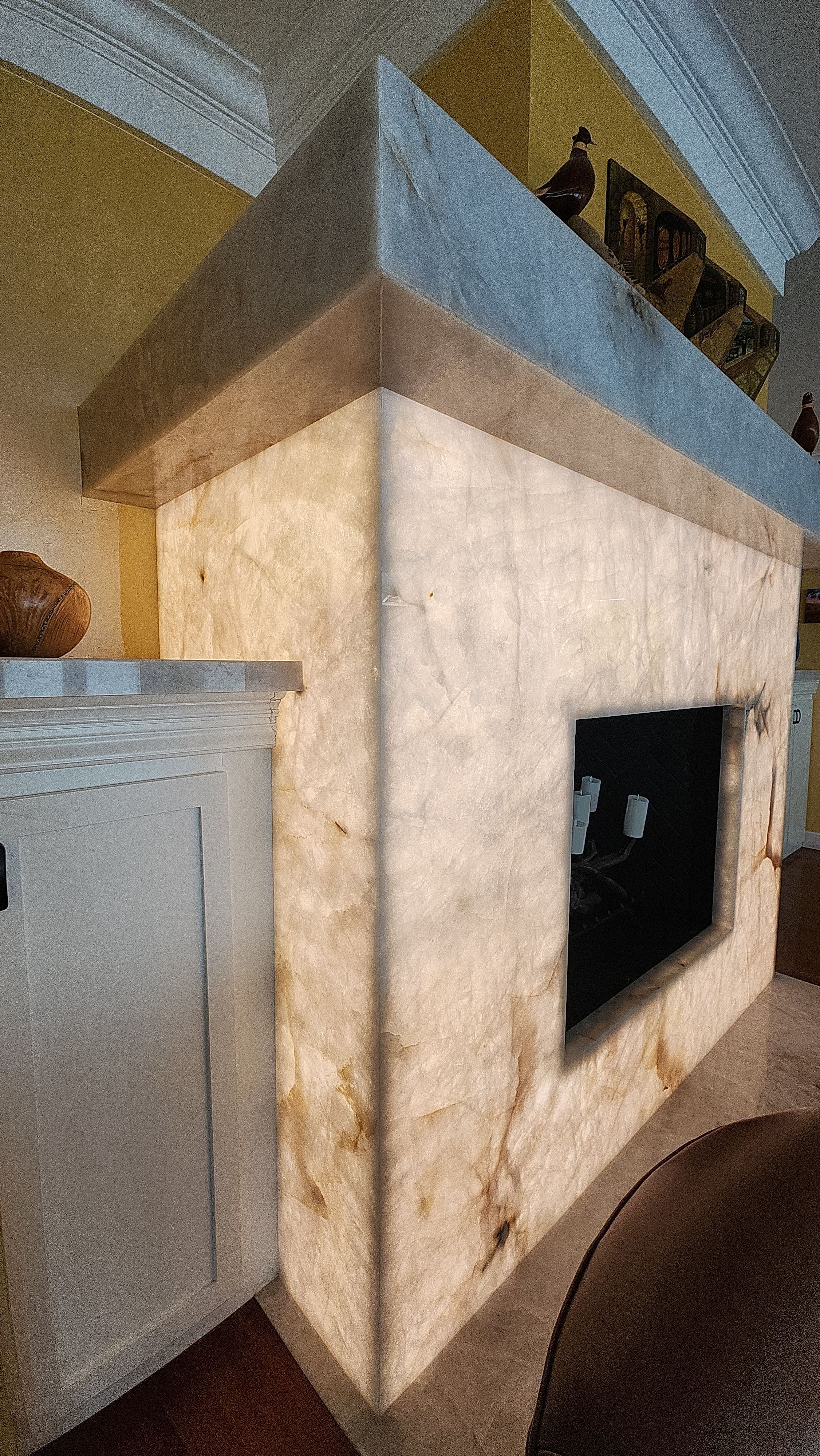 Backlit Stone On A Fireplace by S.Y. Electric Inc.