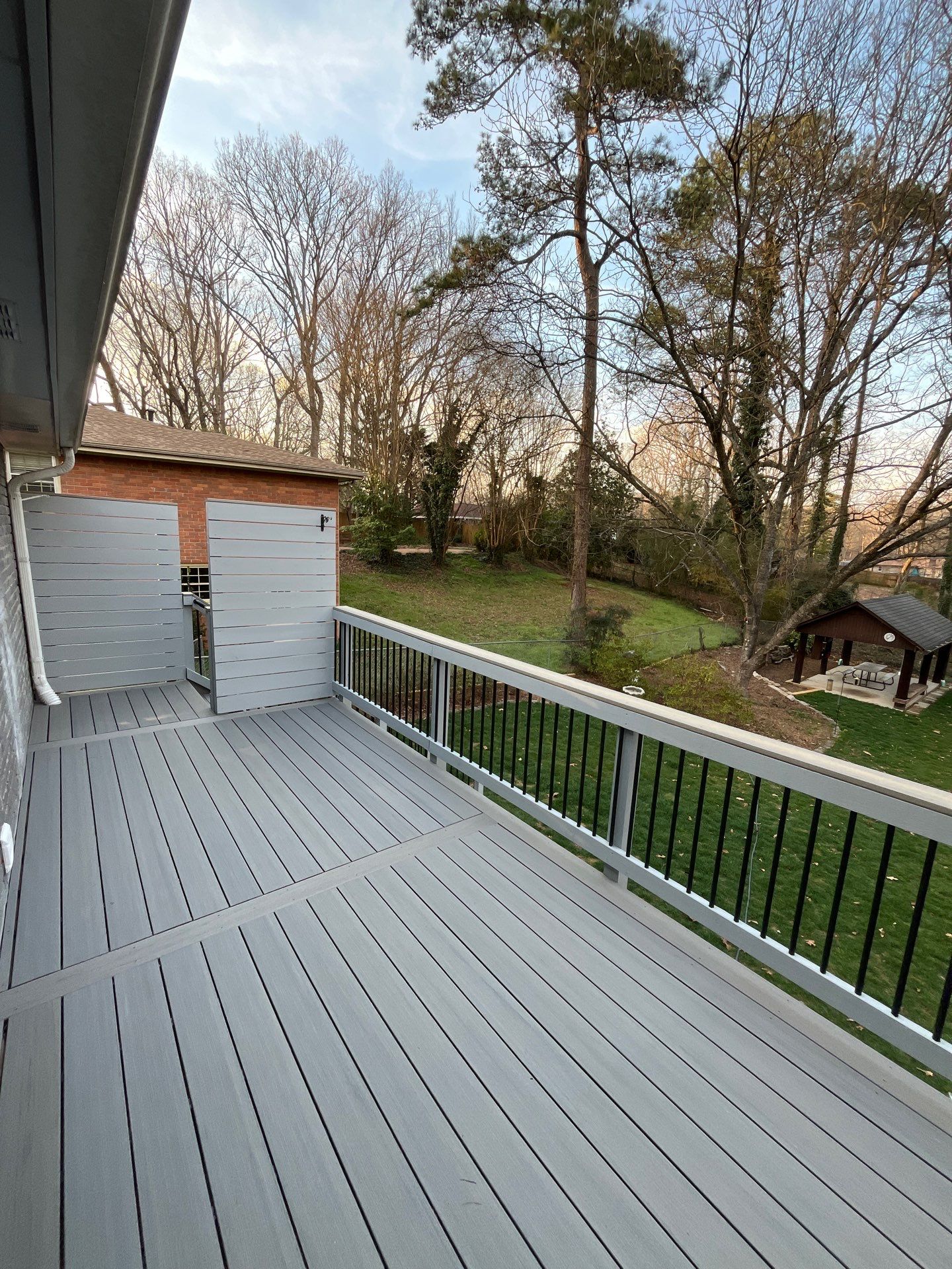 James Hardie Siding Replacement, Trex Railing Install, Exterior Painting, and Staining in Stone Mountain, GA by Nelson Exteriors 