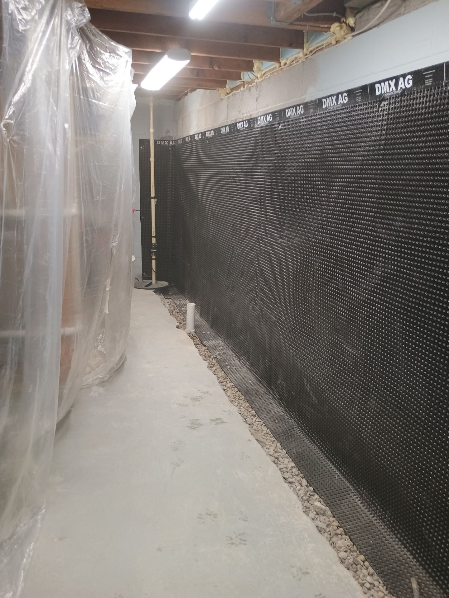 Depressurizing Denny's Basement Wall by Waterproofing Northeast