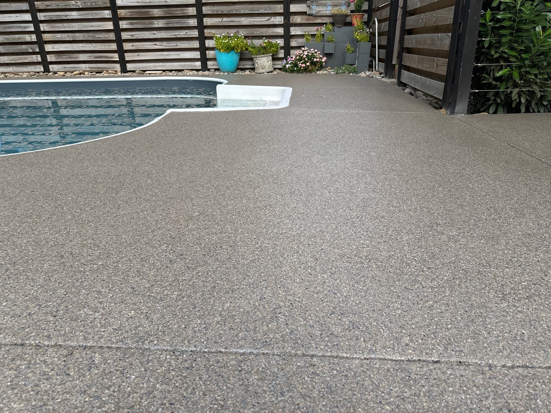 Pool Deck using Obsidian by Elite Floor Solutions