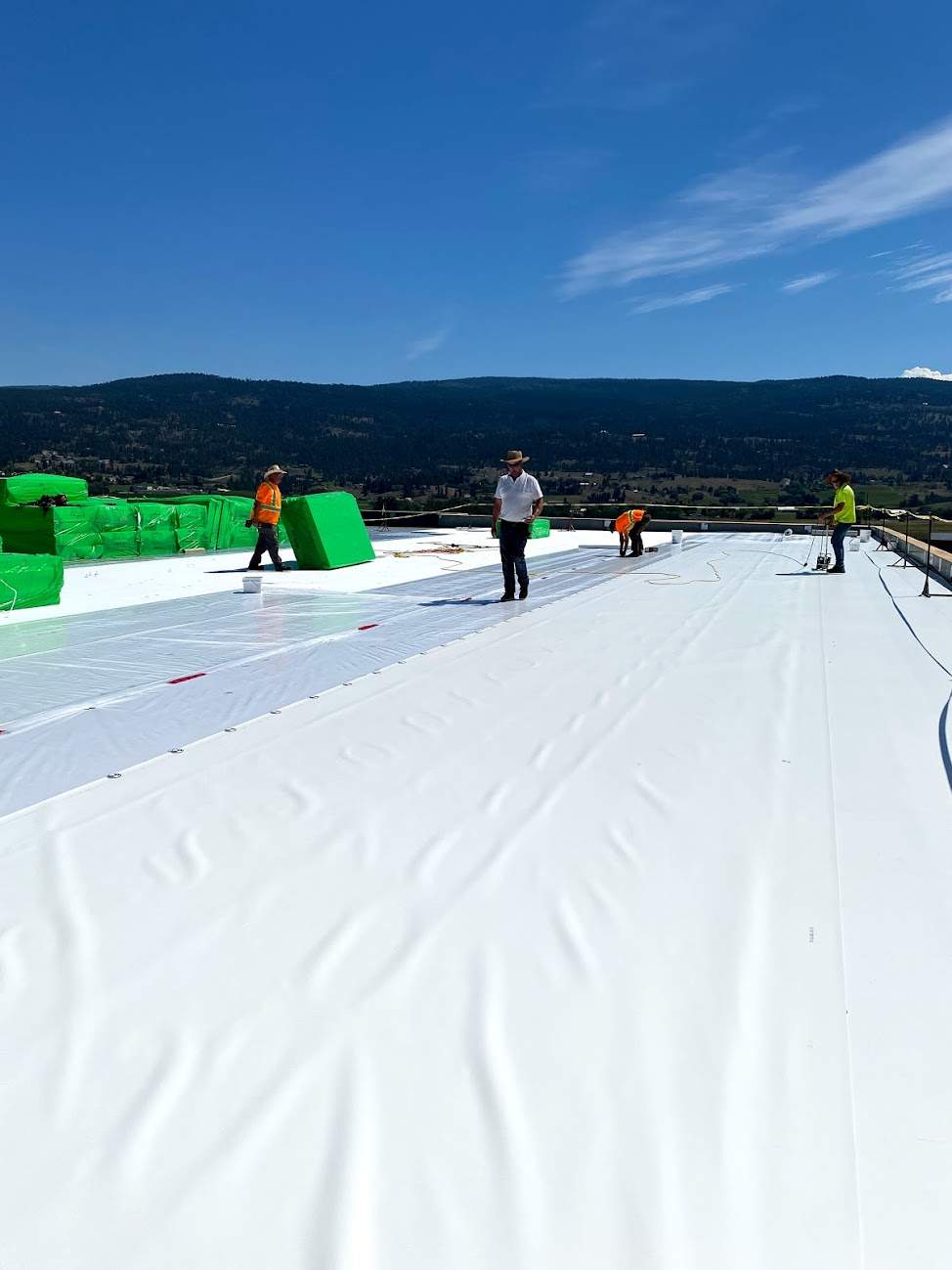 Commercial Roofing Installation using Durolast by Top Notch Roofing Inc