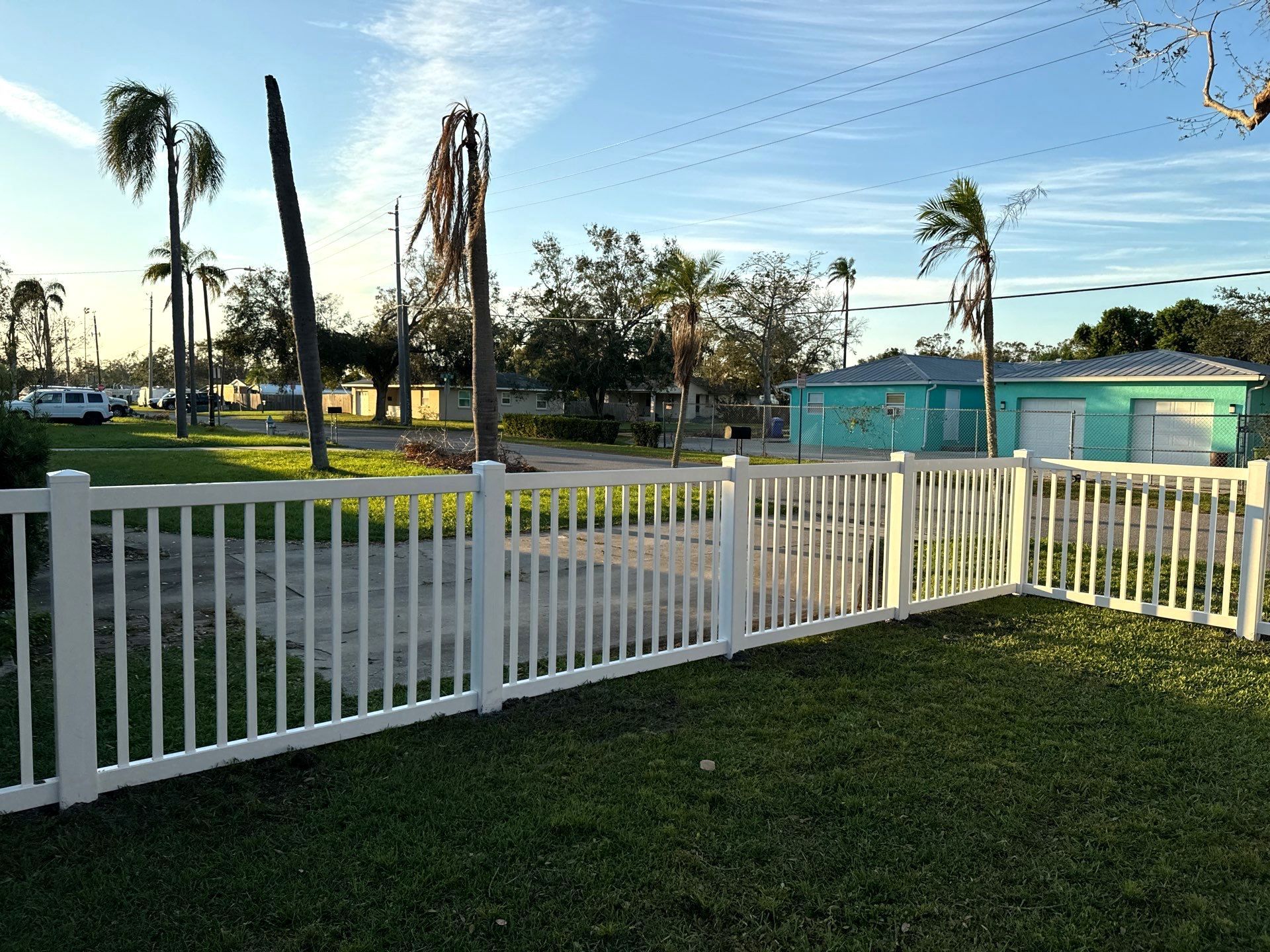 Vinyl Fence Installation using 6Ft White Vinyl Privacy Fence and a 4Ft White Vinyl Picket Fence by Asap fence and gates, LLC