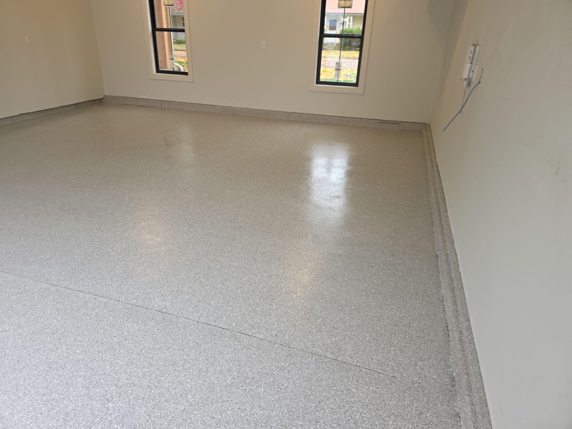 Garage Transformation using Limestone Hybrid by Croc Coatings, LLC