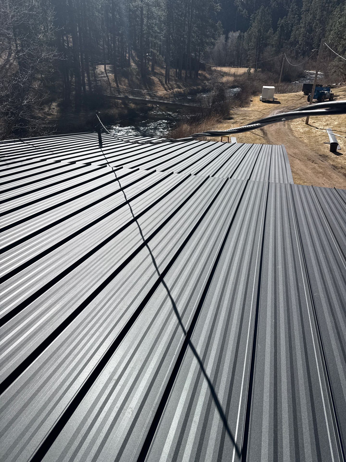 Residential Roofing Installation using Steel Roofing by Weather-Tite Exteriors LLC