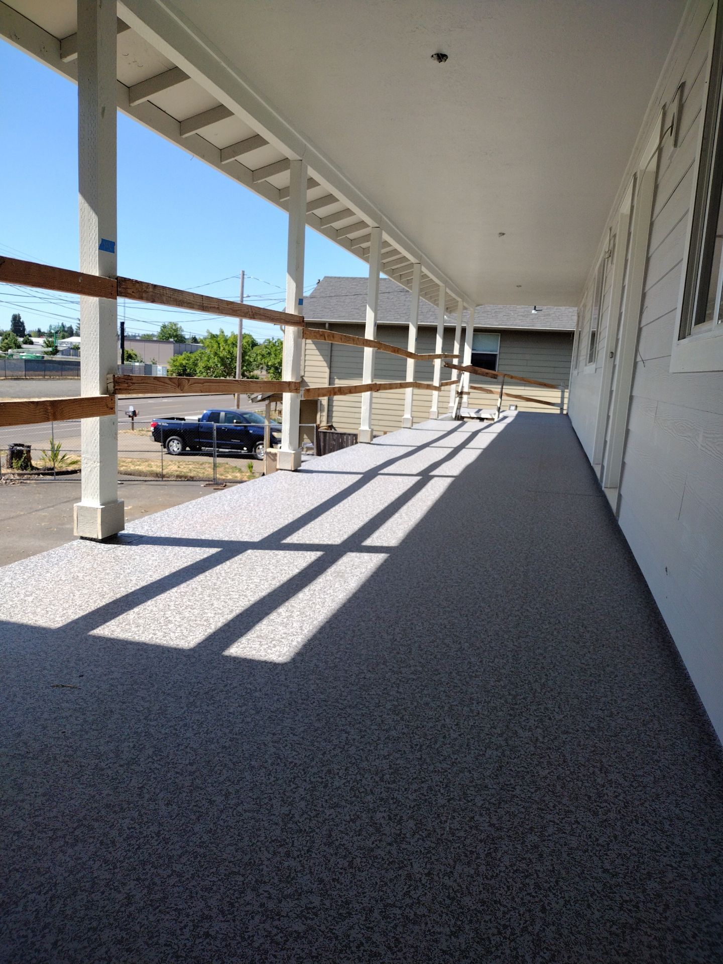 Dec-Tec Walkable Membrane using Dec-Tec (Color: Granite) by Orezona Building & Roofing Company, Inc.