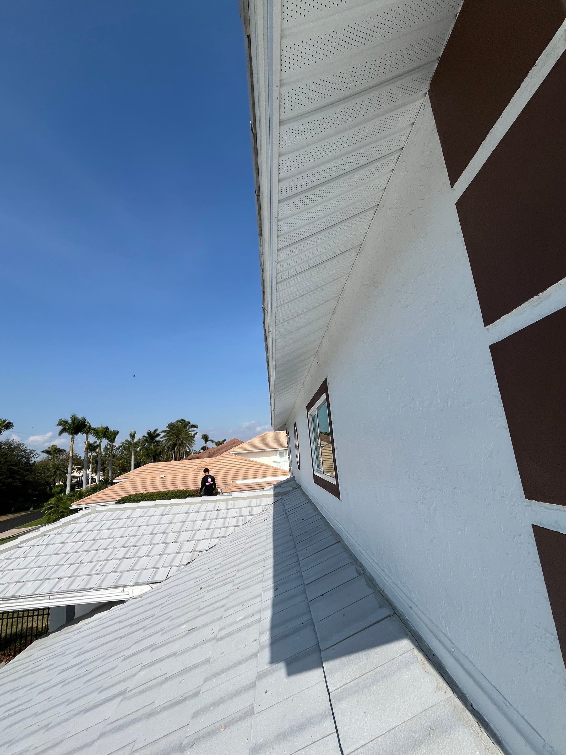 Repainting and Upgrading Gutters in Sarasota FL by Gutter Professors