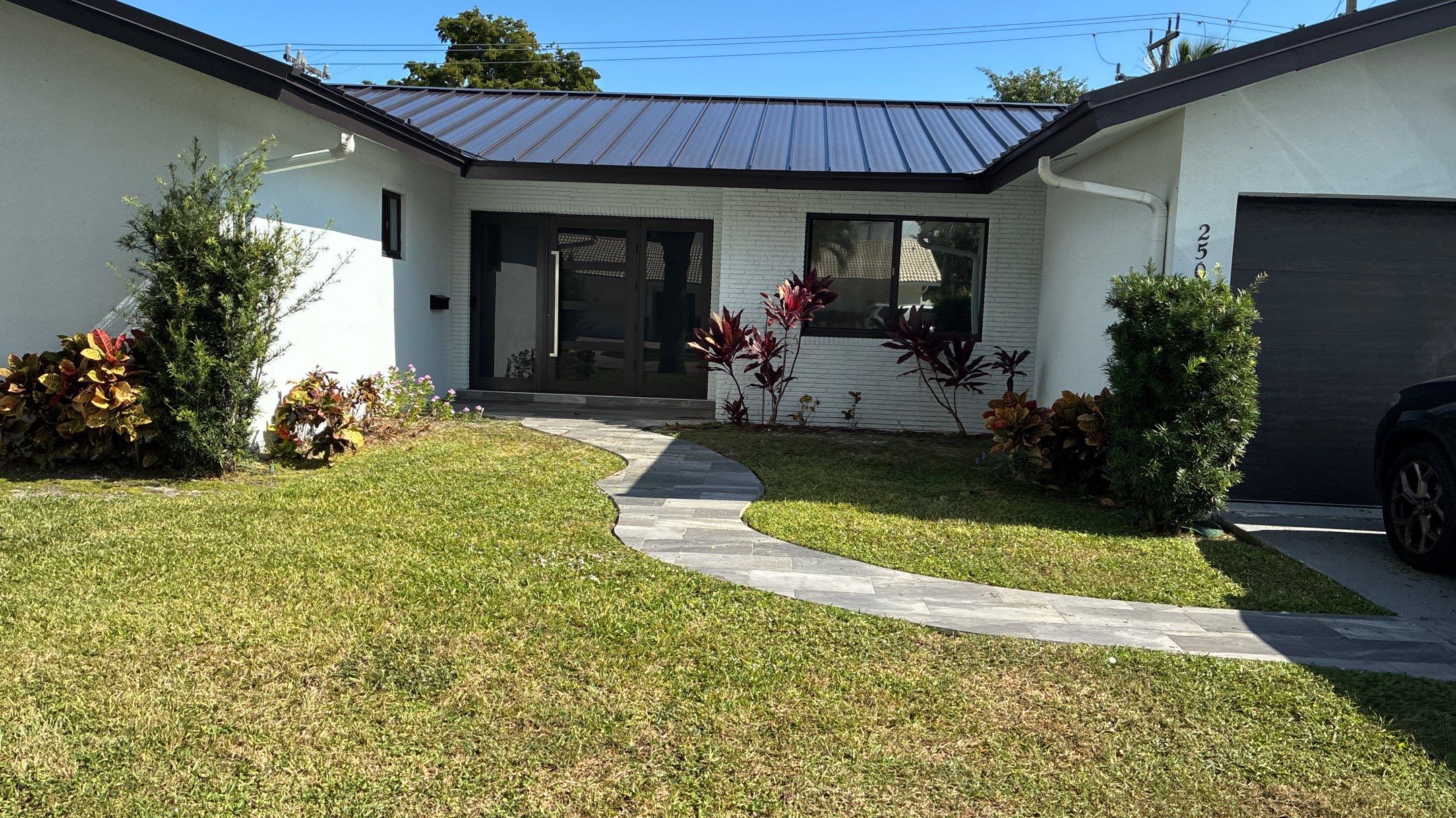 Residential Roofing Installation using 1" Nail strip metal roof by BLUES BROTHERS ROOFING