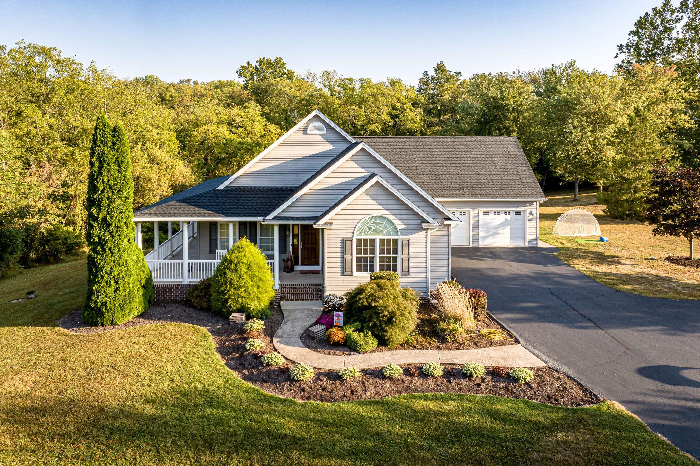 Full Vinyl Siding Replacement and Shingle Roof Install in Millersburg by Esh Builders