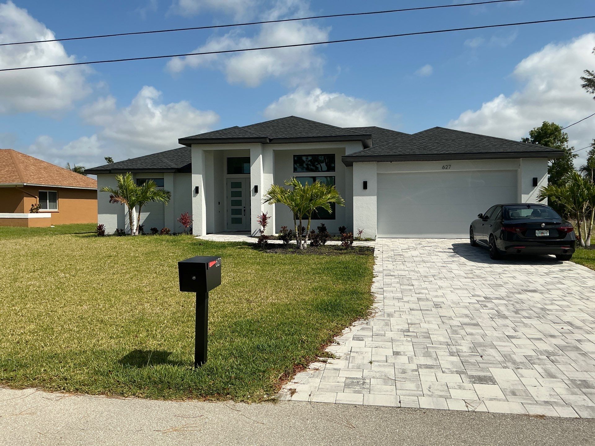 Bronze Aluminum Seamless Gutters Installed in Cape Coral FL by Gutter Professors
